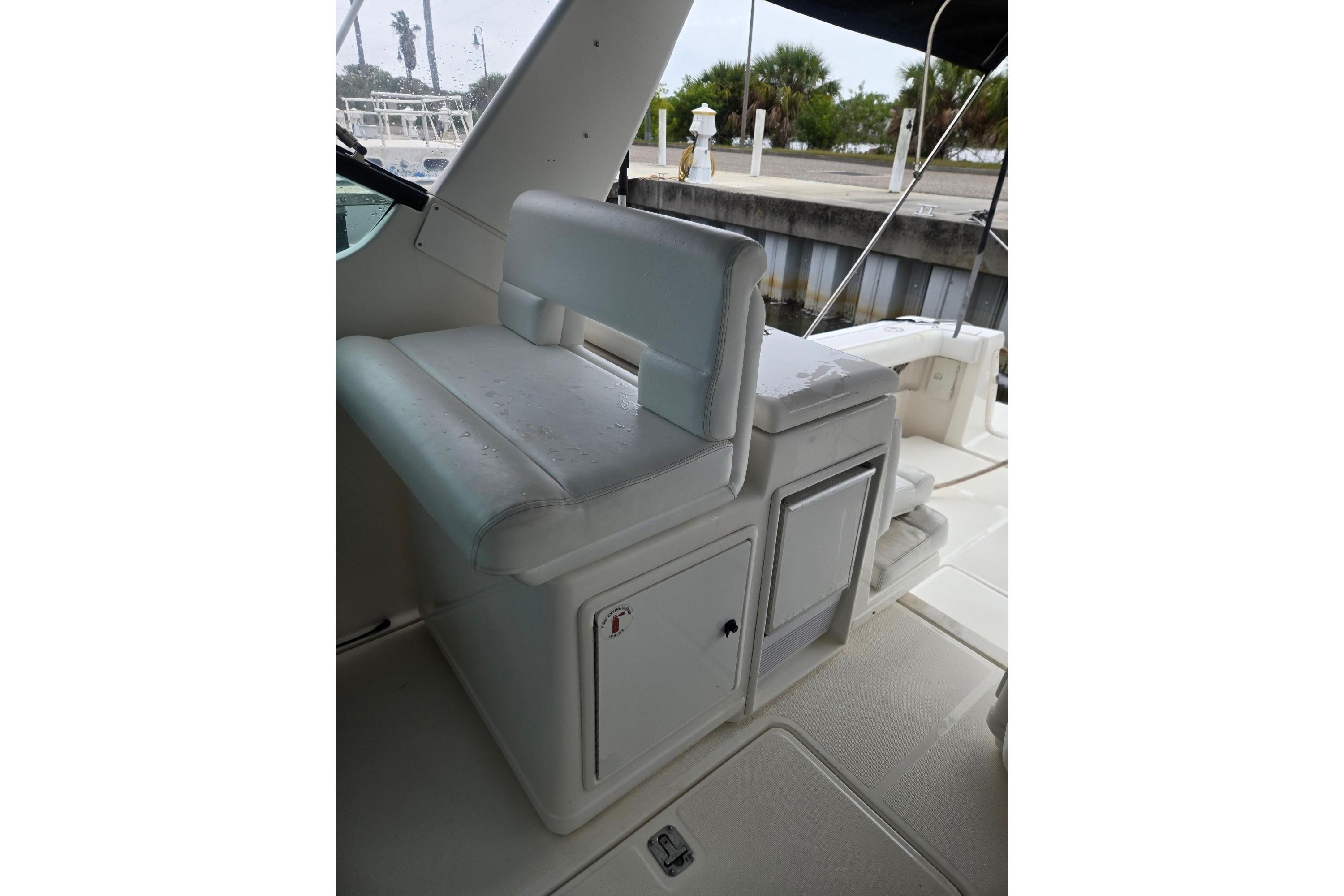 2002 Tiara Yachts 3500 Open interior seating and storage area.