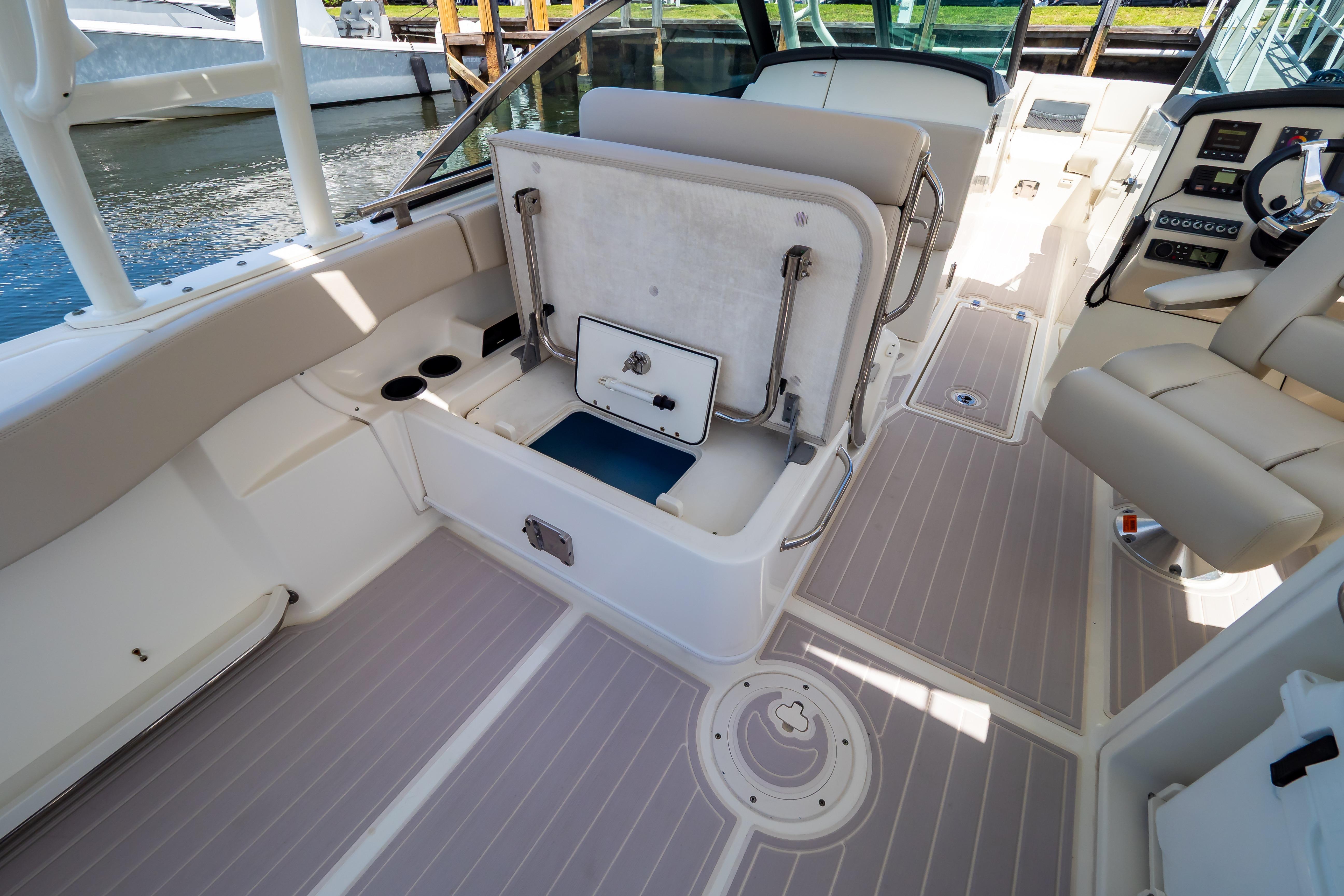2019 Boston Whaler 270 Vantage interior with seating and storage compartments.