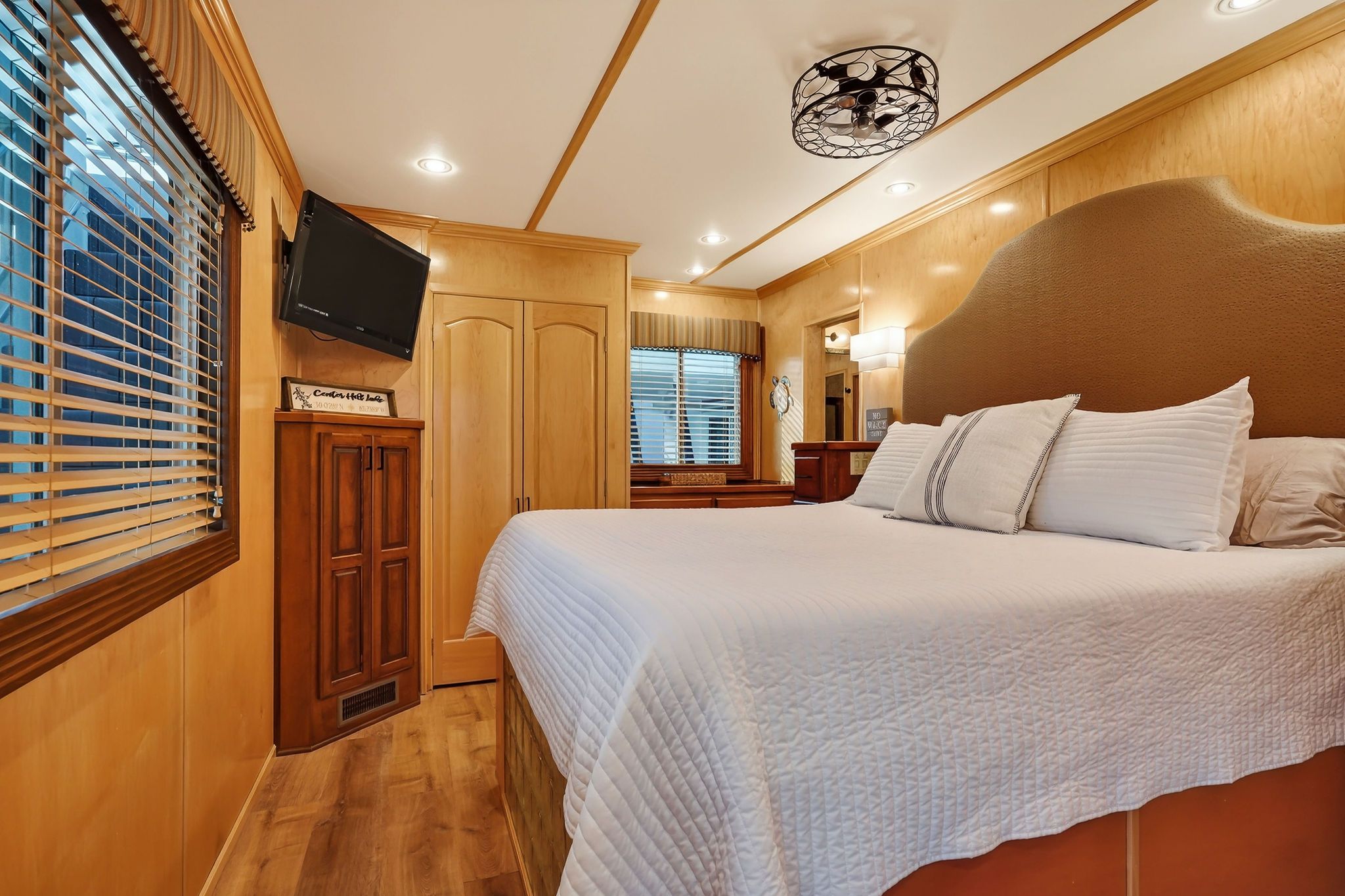 Luxurious bedroom on a 2010 Houseboat Throughbred.