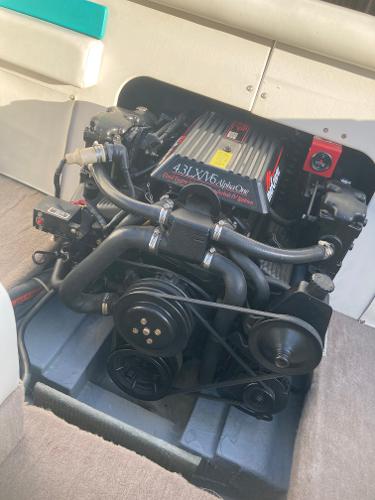 Engine of a 1992 Regal Valanti 200 boat, close-up view.