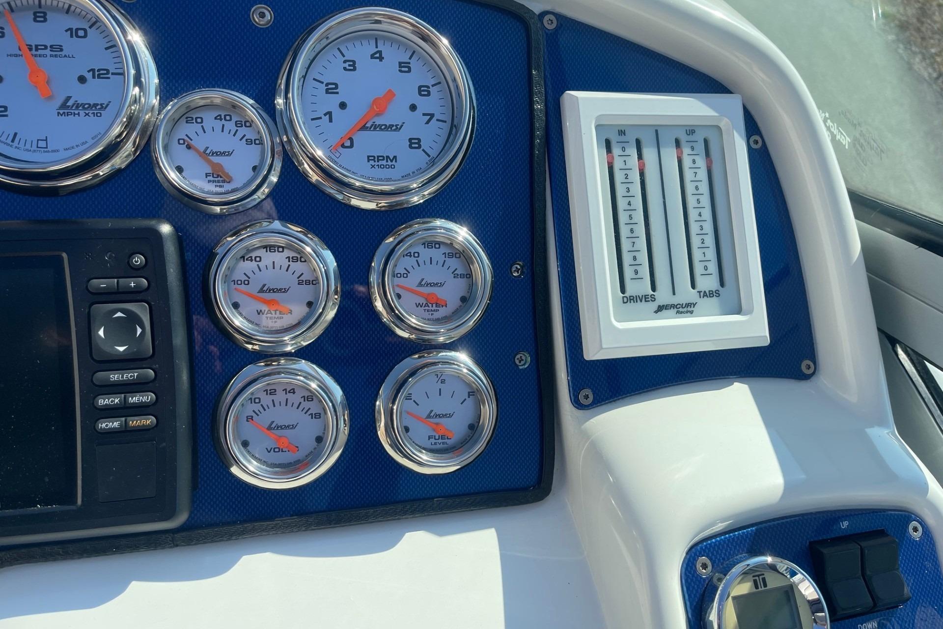 Dashboard of a 2004 Formula 382 FASTech boat with Livorsi gauges and controls.