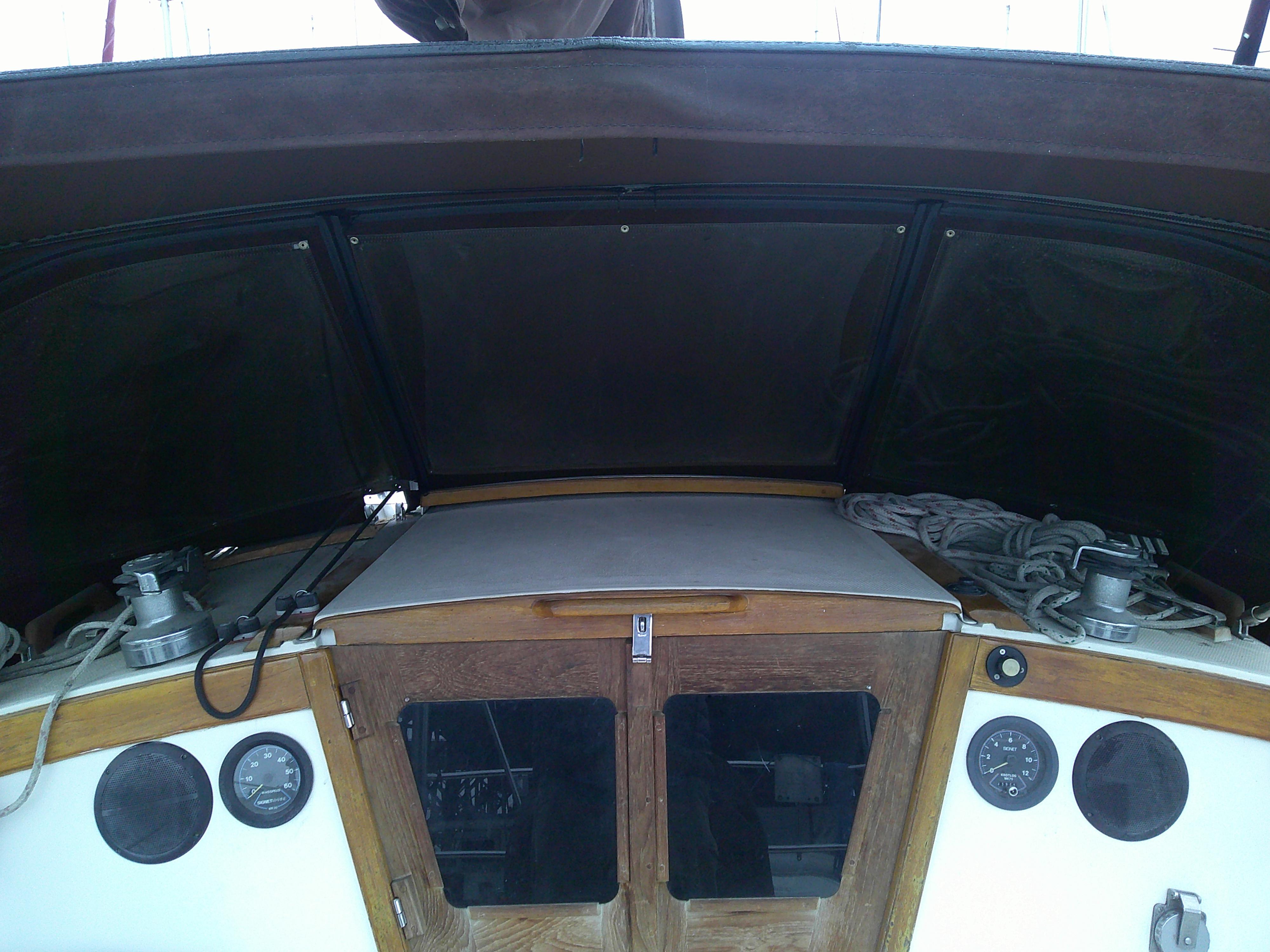 1984 Catalina 36' sloop cockpit with wooden hatch and navigation instruments.