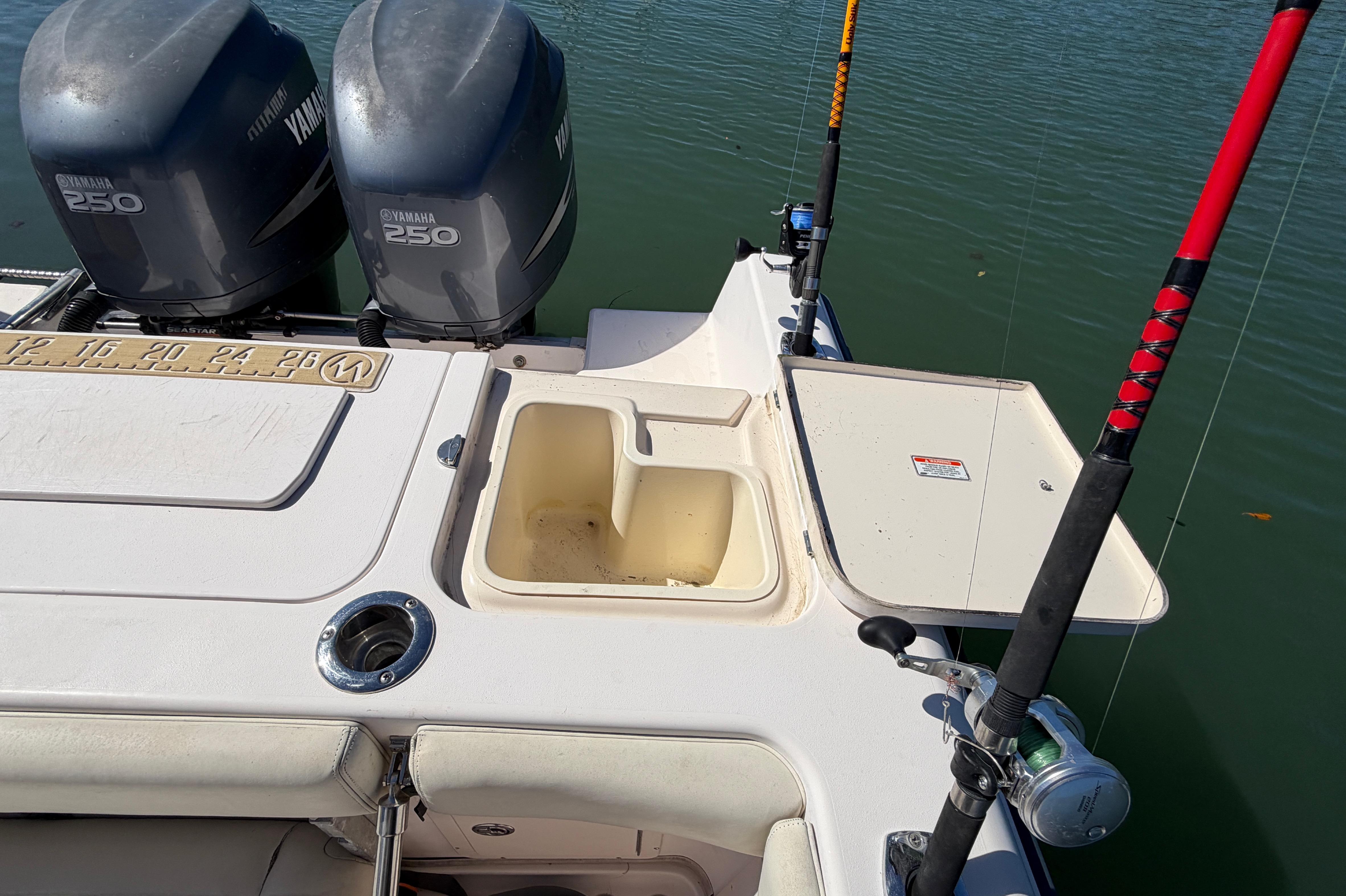 2006 Grady-White Sailfish 282 boat with Yamaha 250 engines and fishing rods.