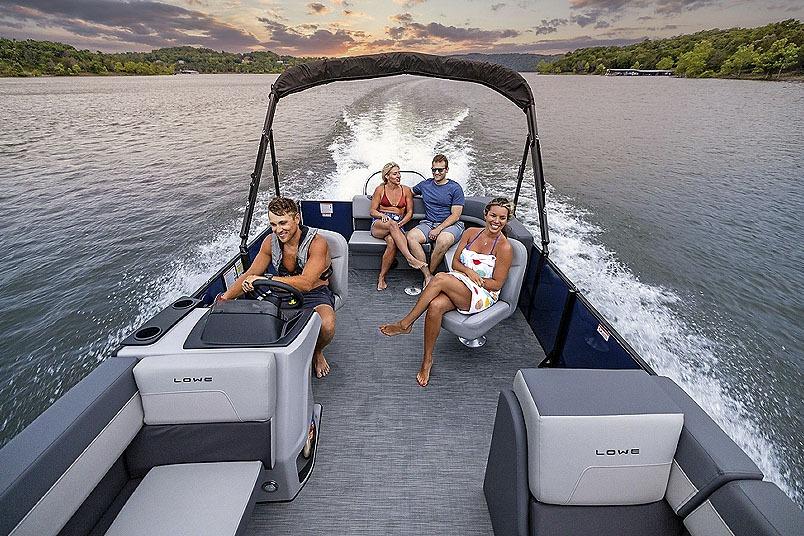 Manufacturer Provided Image: 2026 Lowe LS 210 WT boat cruising with passengers on a scenic lake.