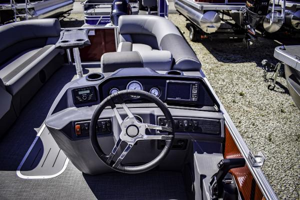 2024 Bennington 22 SVSB pontoon boat interior with modern dashboard and seating.