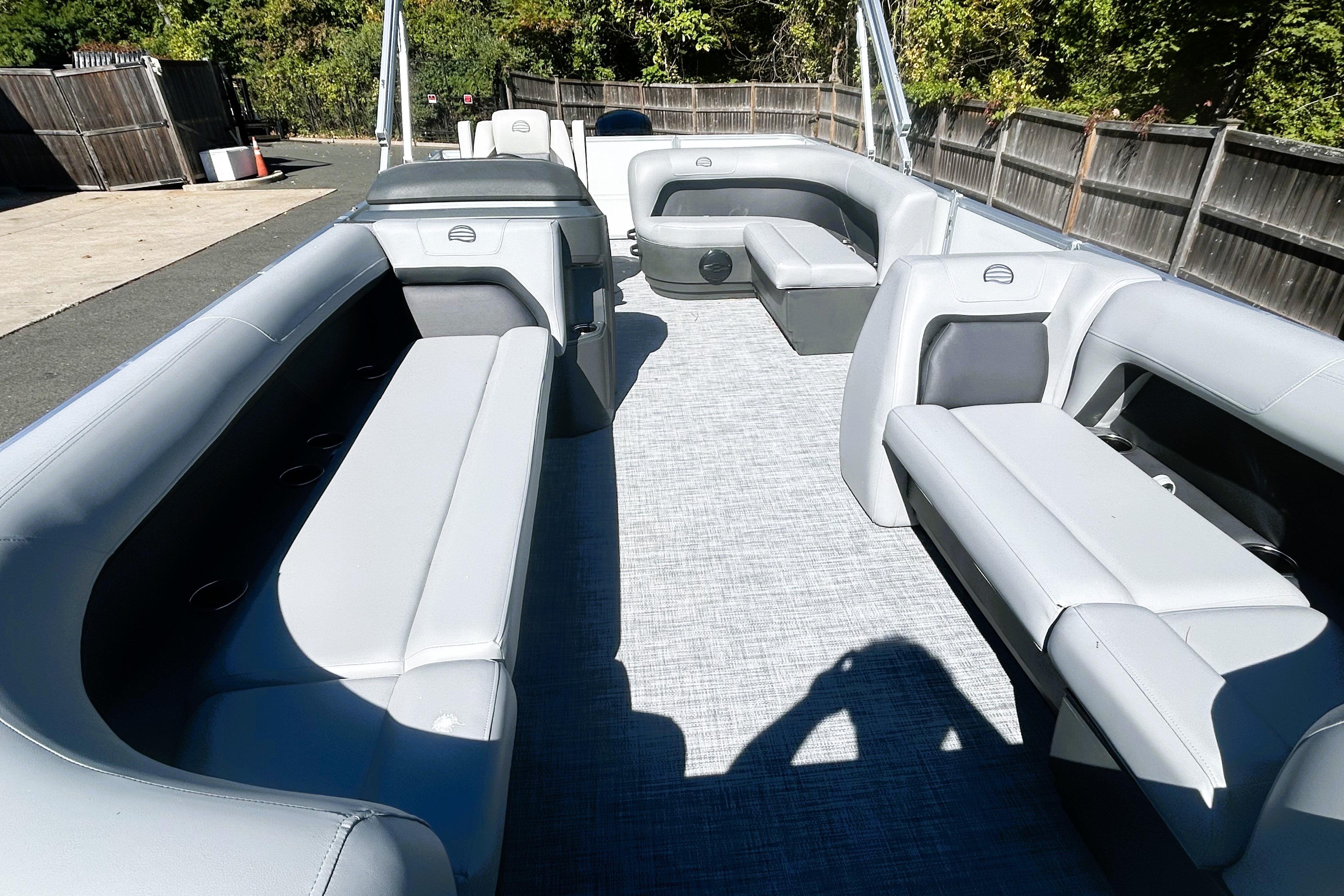 2026 Sun Tracker Party Barge 18 DLX interior with spacious seating and modern design.