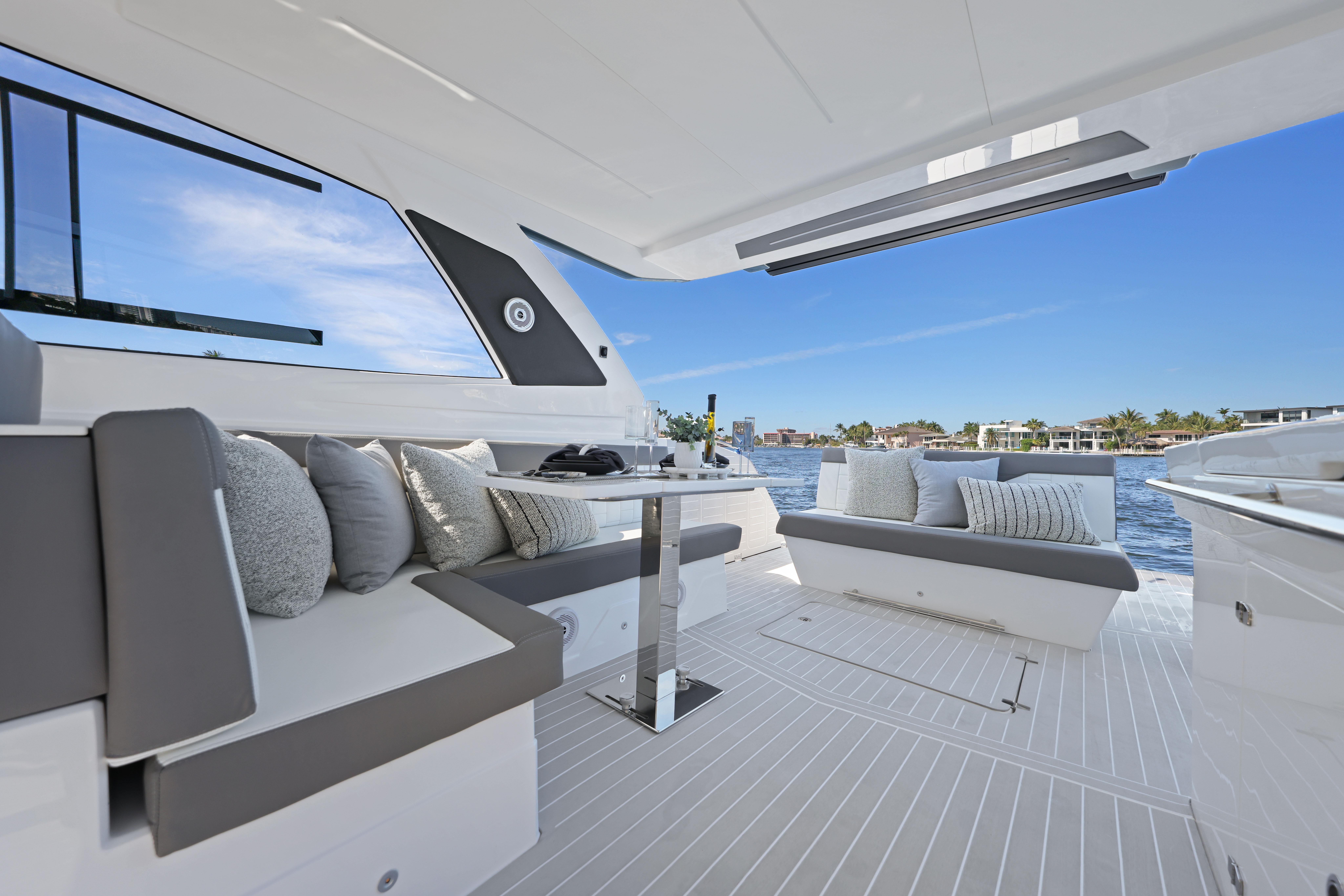 Luxurious 2025 Valiatt 380 Bowrider yacht interior with elegant seating and scenic water view.