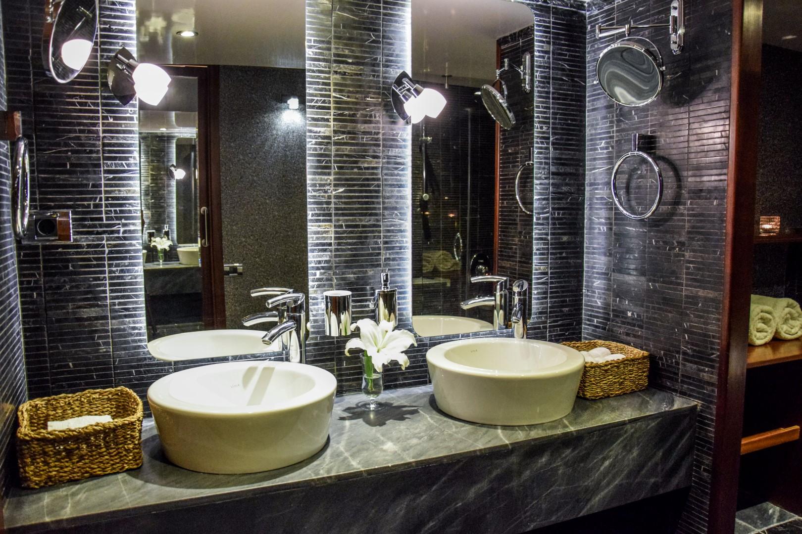 Luxurious bathroom on 2007 Custom 34m Steel Hull Gulet with dual sinks and modern decor.