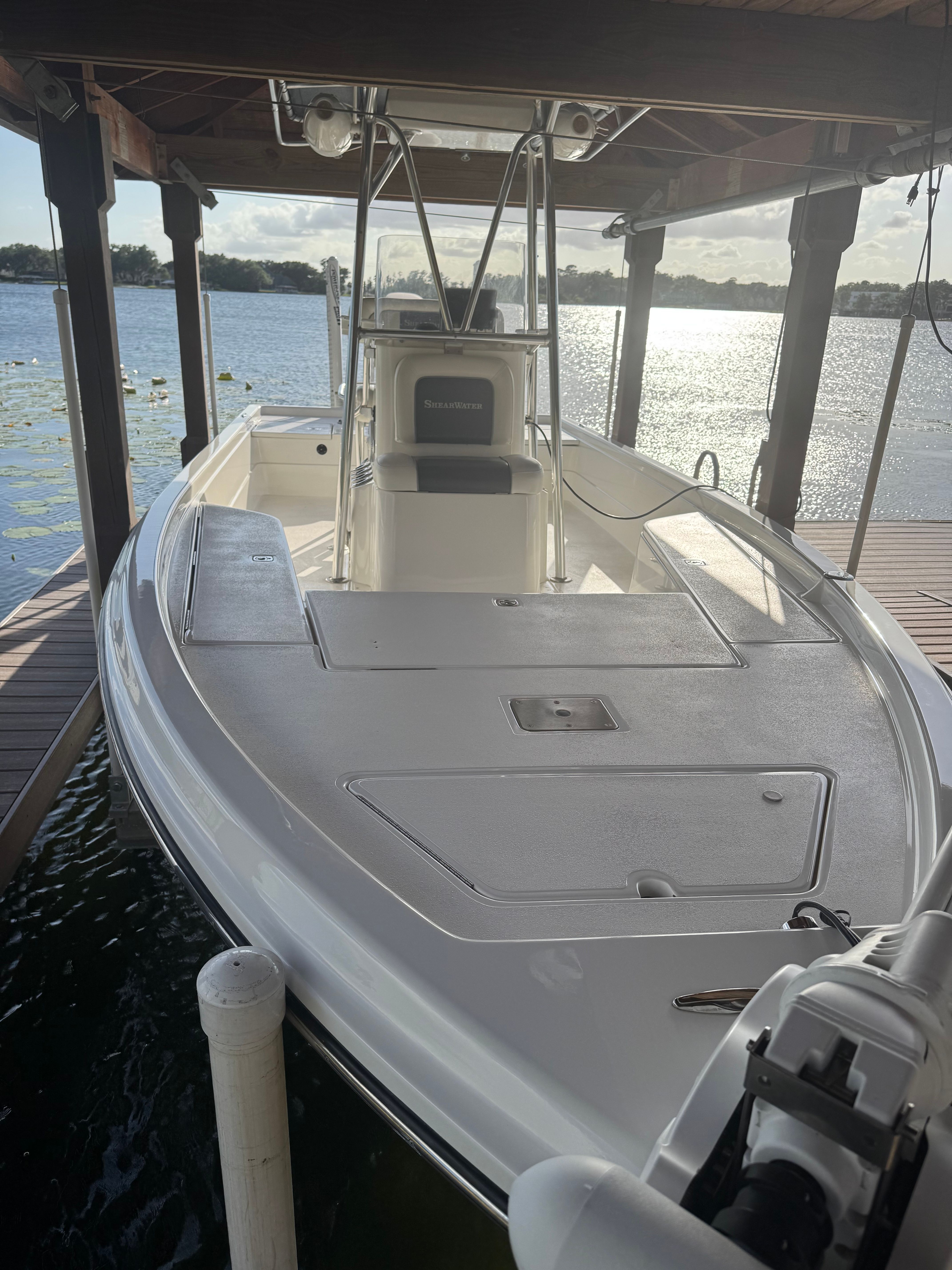 2004 ShearWater LTZ boat docked at sunset.