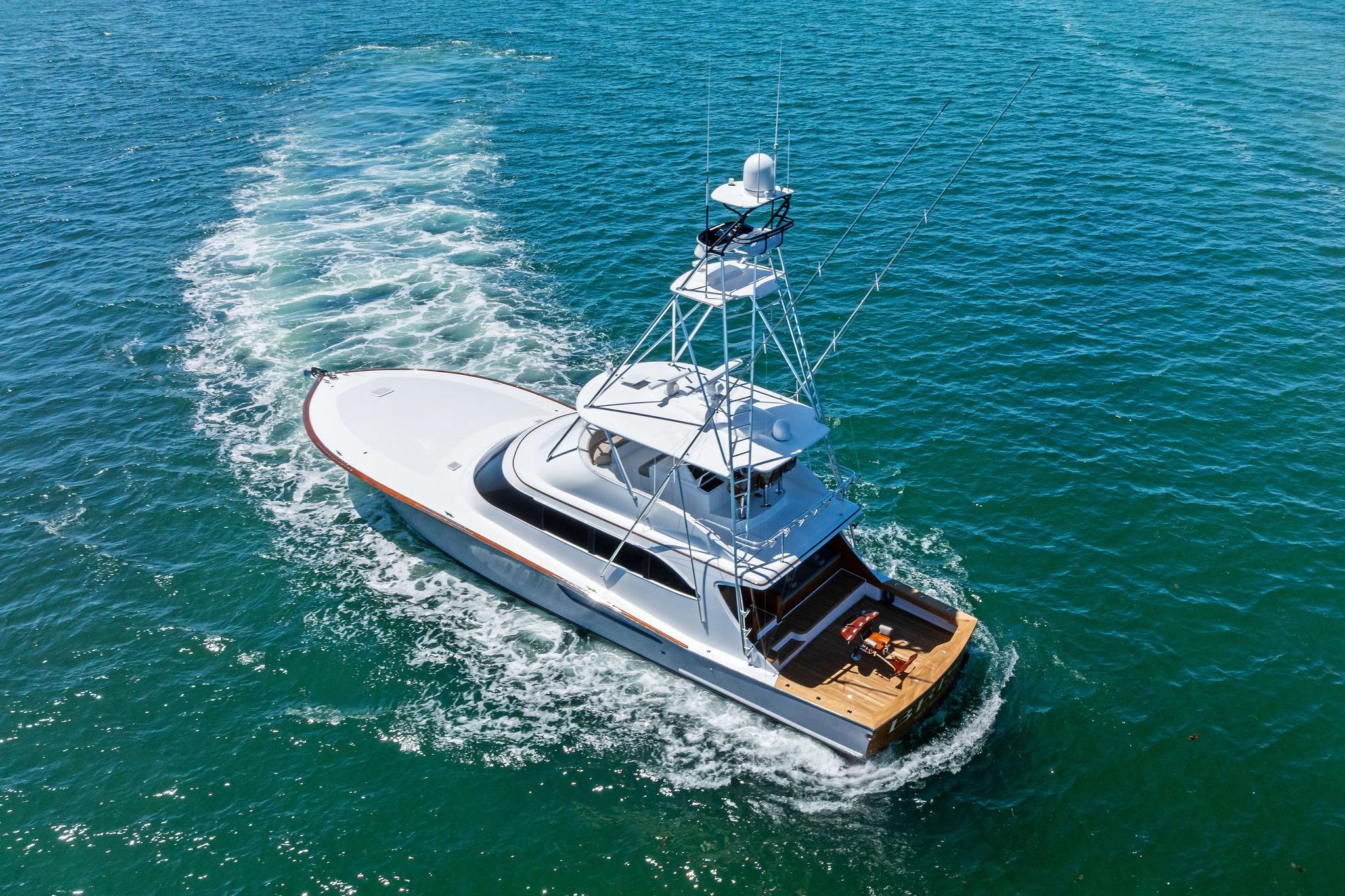 2017 Weaver Custom Sportfish yacht cruising on clear blue ocean waters.