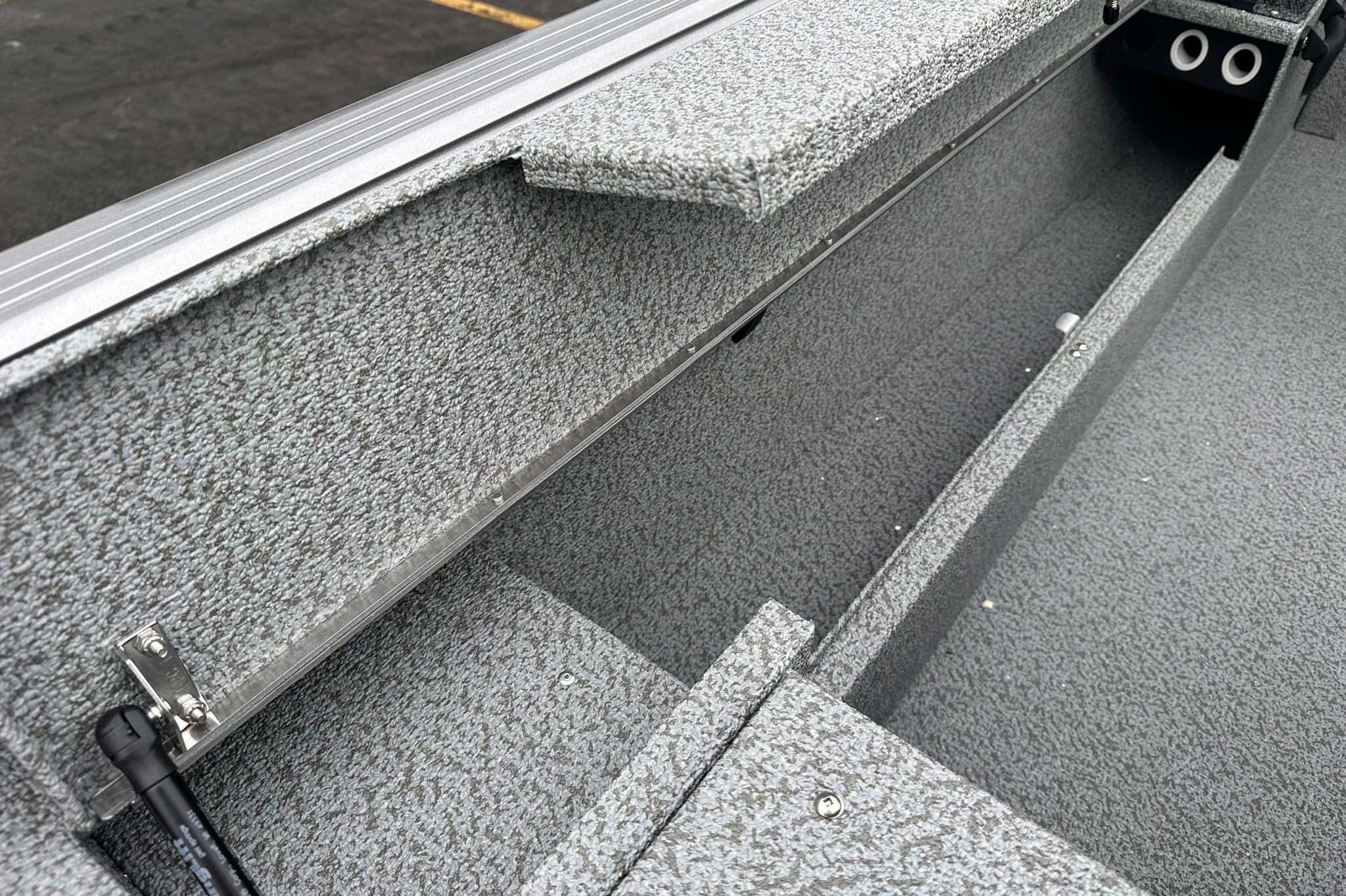 2026 Lund 1775 Impact XS Sport boat interior with gray textured finish.