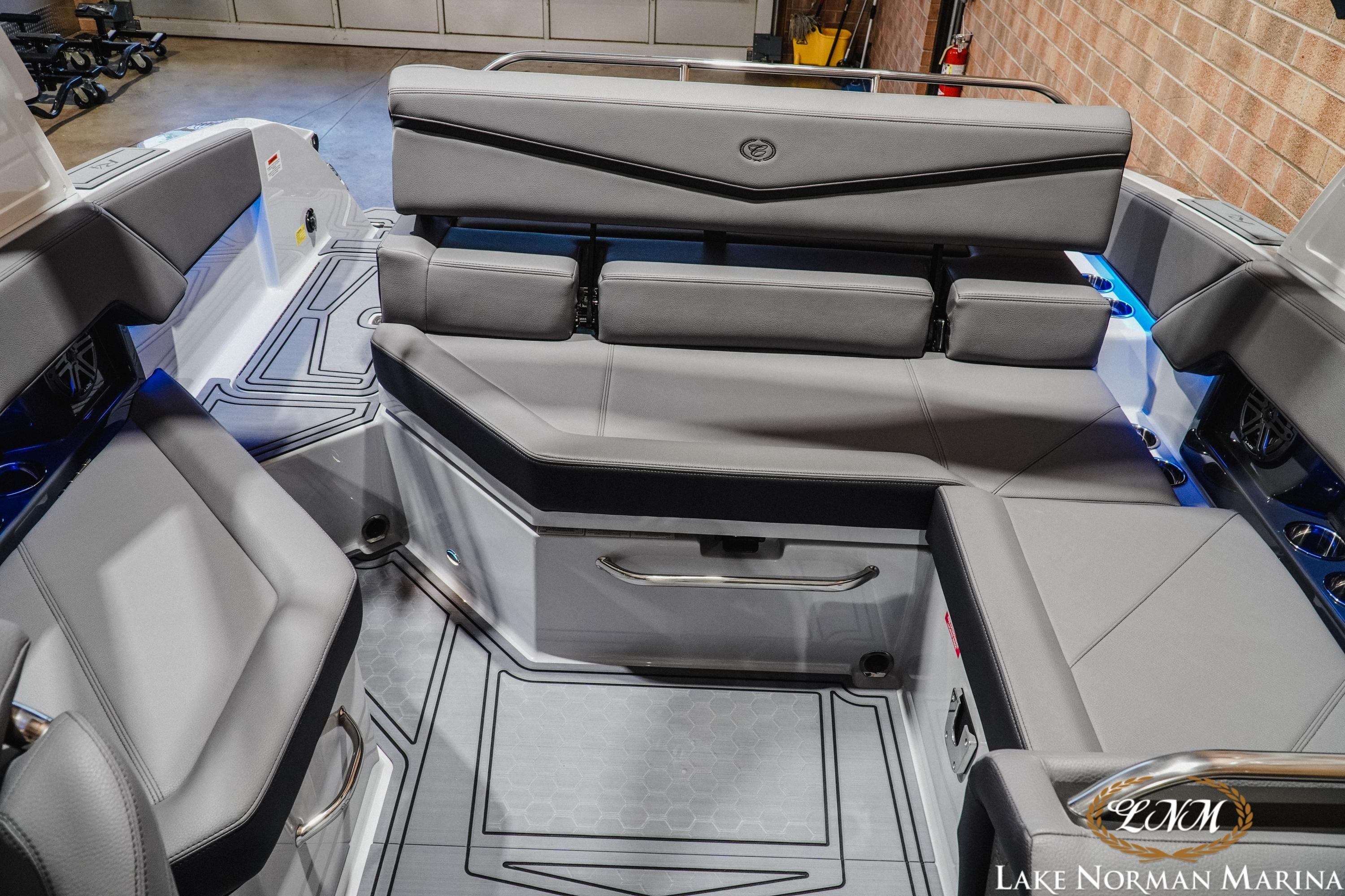 2026 Cobalt R4 Surf boat interior with sleek gray seating and modern design.