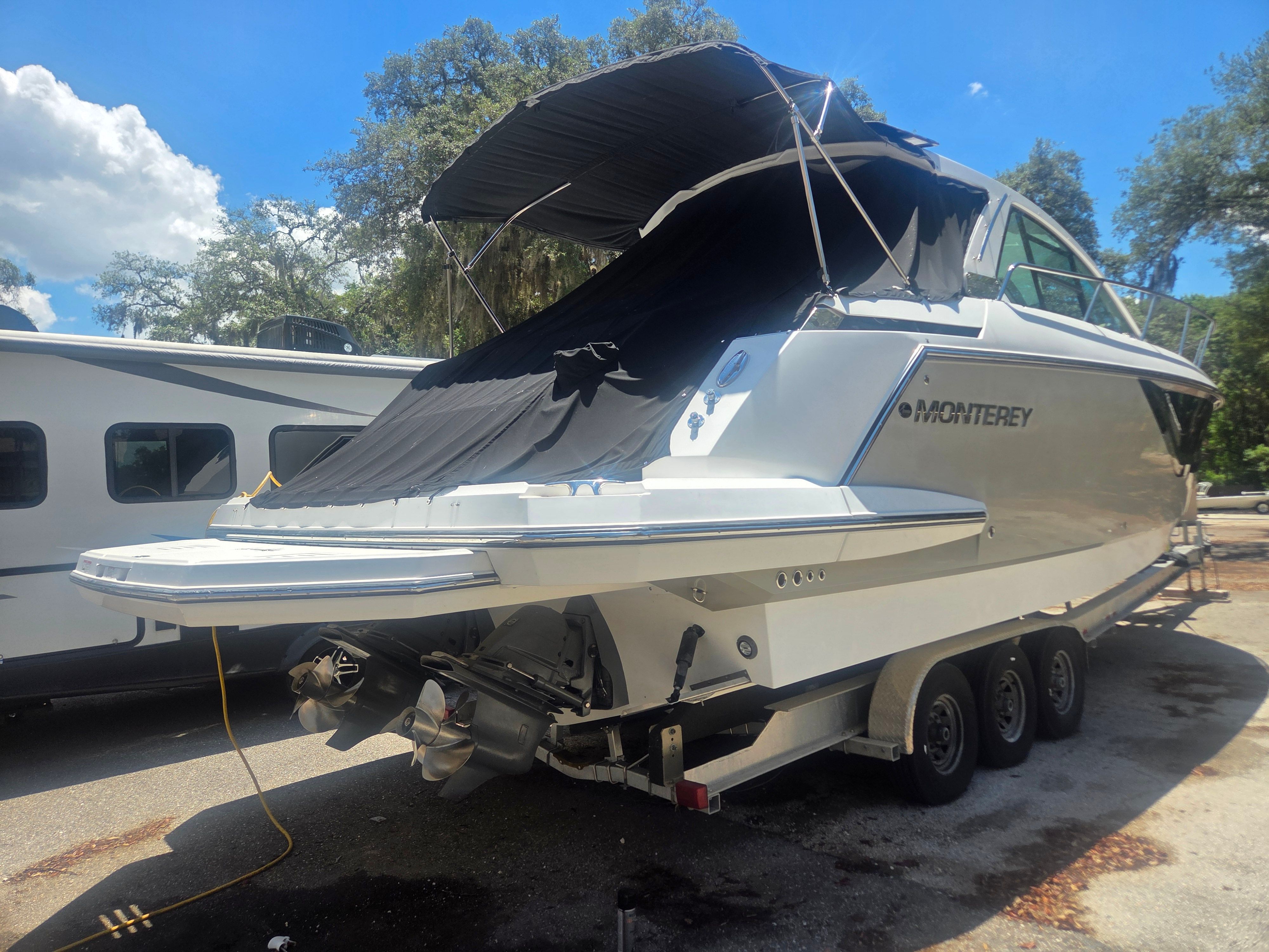 2019 Monterey 360SC boat parked outdoors on a trailer.