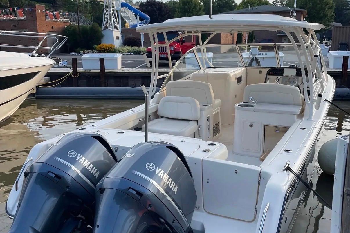 2019 Grady-White Freedom 307 boat docked with twin Yamaha engines.