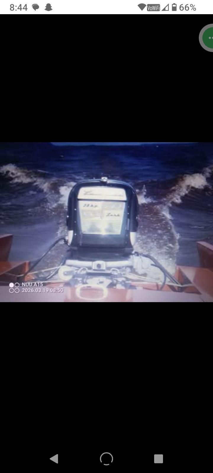1957 Chris-Craft Comet on water with motor in action.