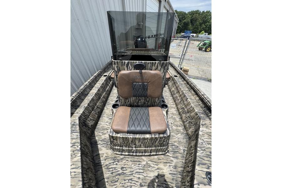 2027 Excel 230 Bay Pro Elite boat with camo design and cushioned seating.