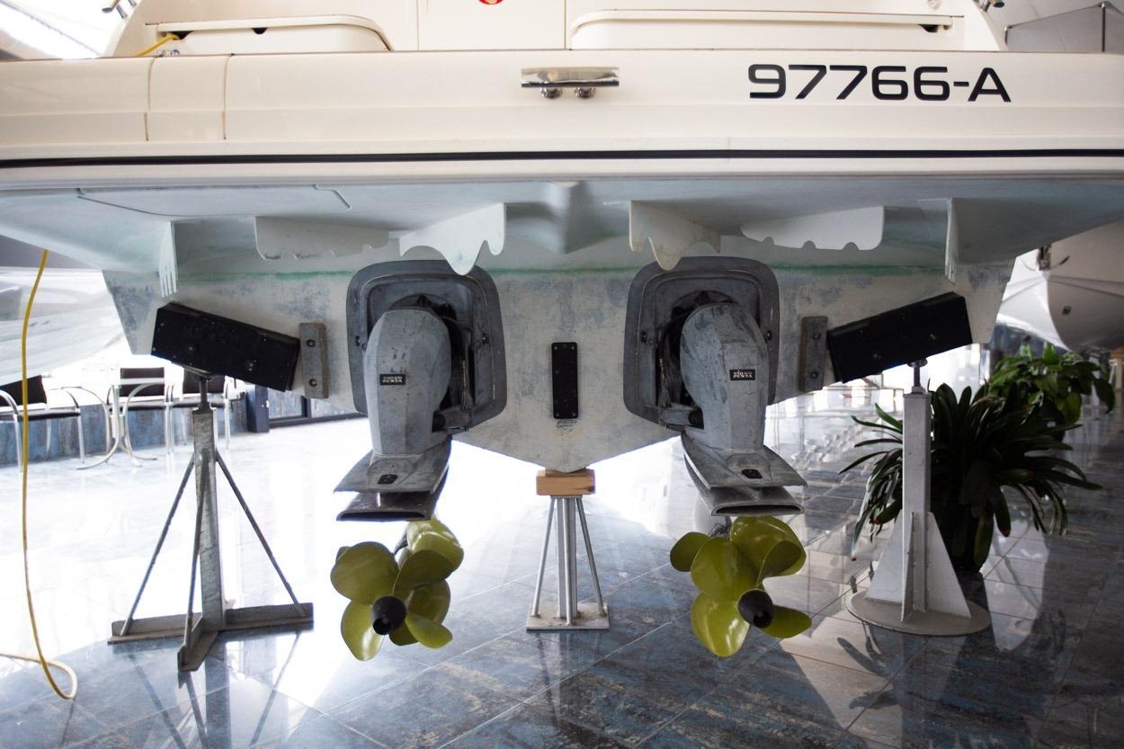2022 Marex 360 Cabriolet Cruiser, dual propellers, indoor display, rear view.