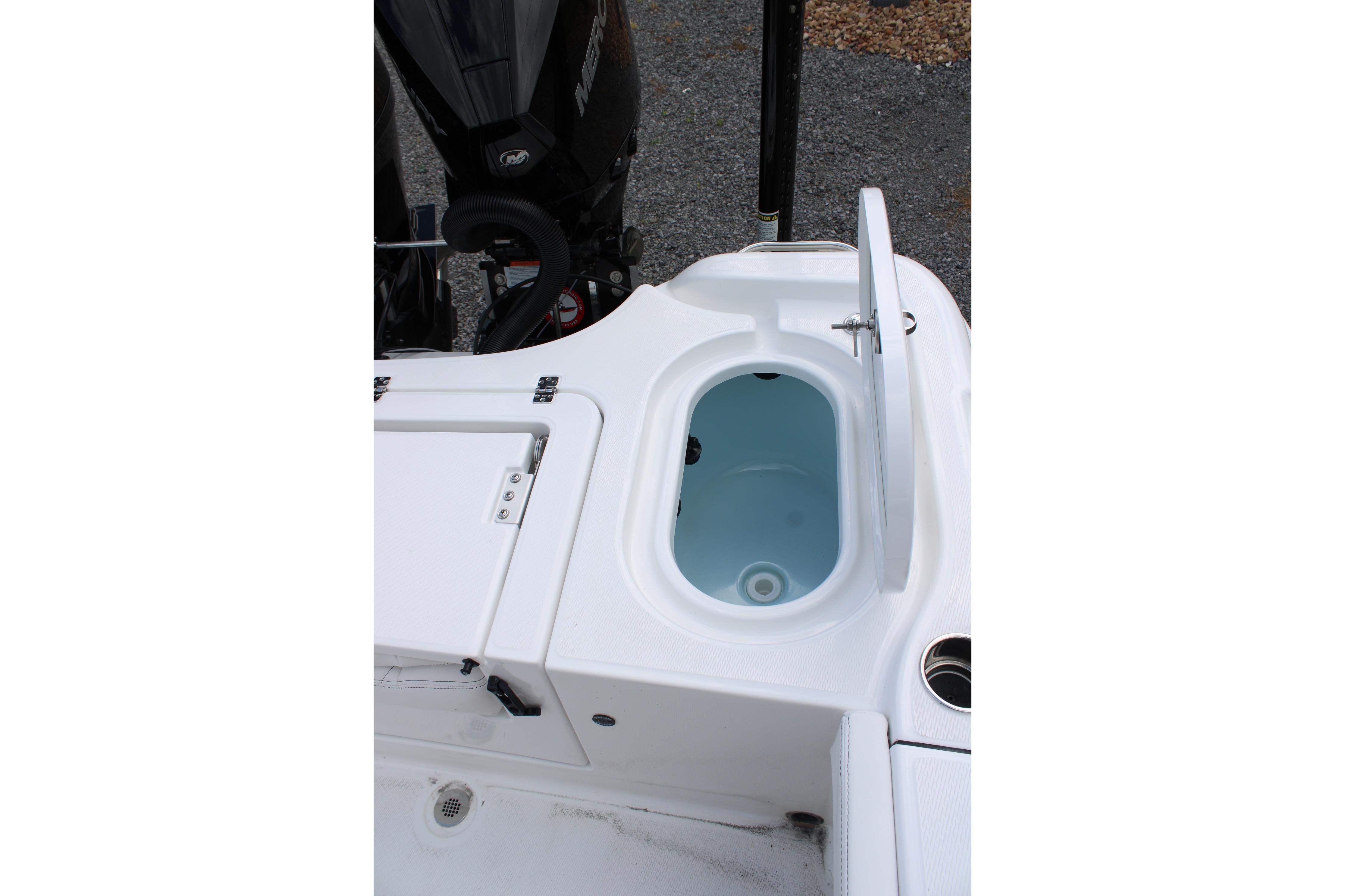 2027 Blazer Bay Makaira 2800 boat deck with open storage compartment.