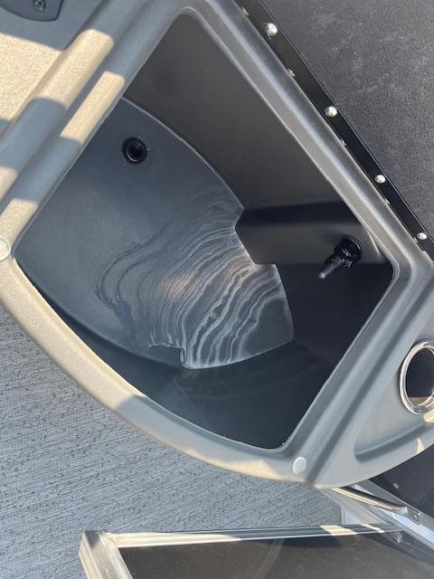 Livewell compartment in 2026 Sun Tracker Fishin' Barge 20 DLX pontoon boat.
