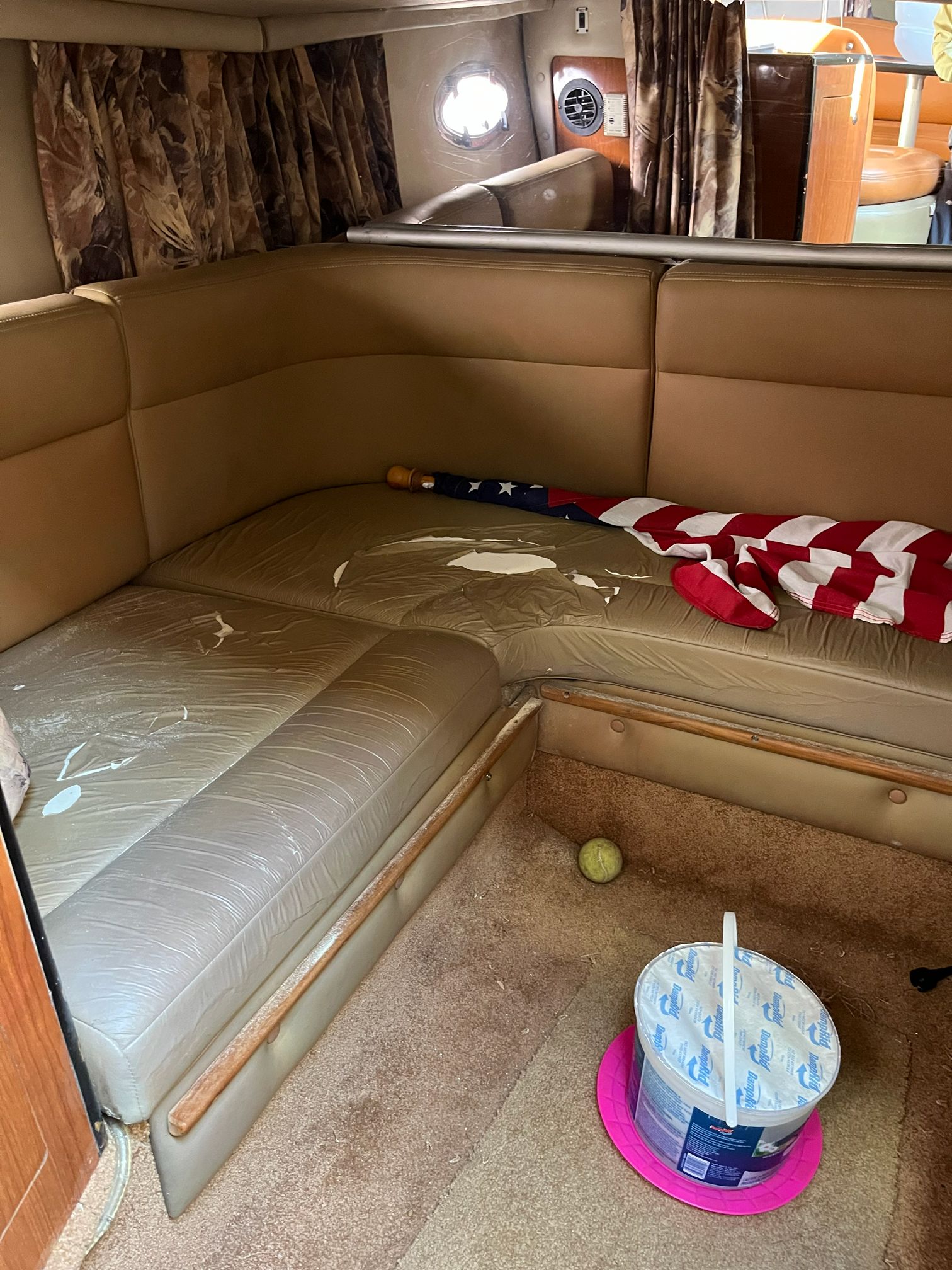Interior of a 2000 Chaparral Signature with flag and paint.
