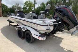 2026 Nitro Z21 XL Pro boat on trailer, parked outdoors.