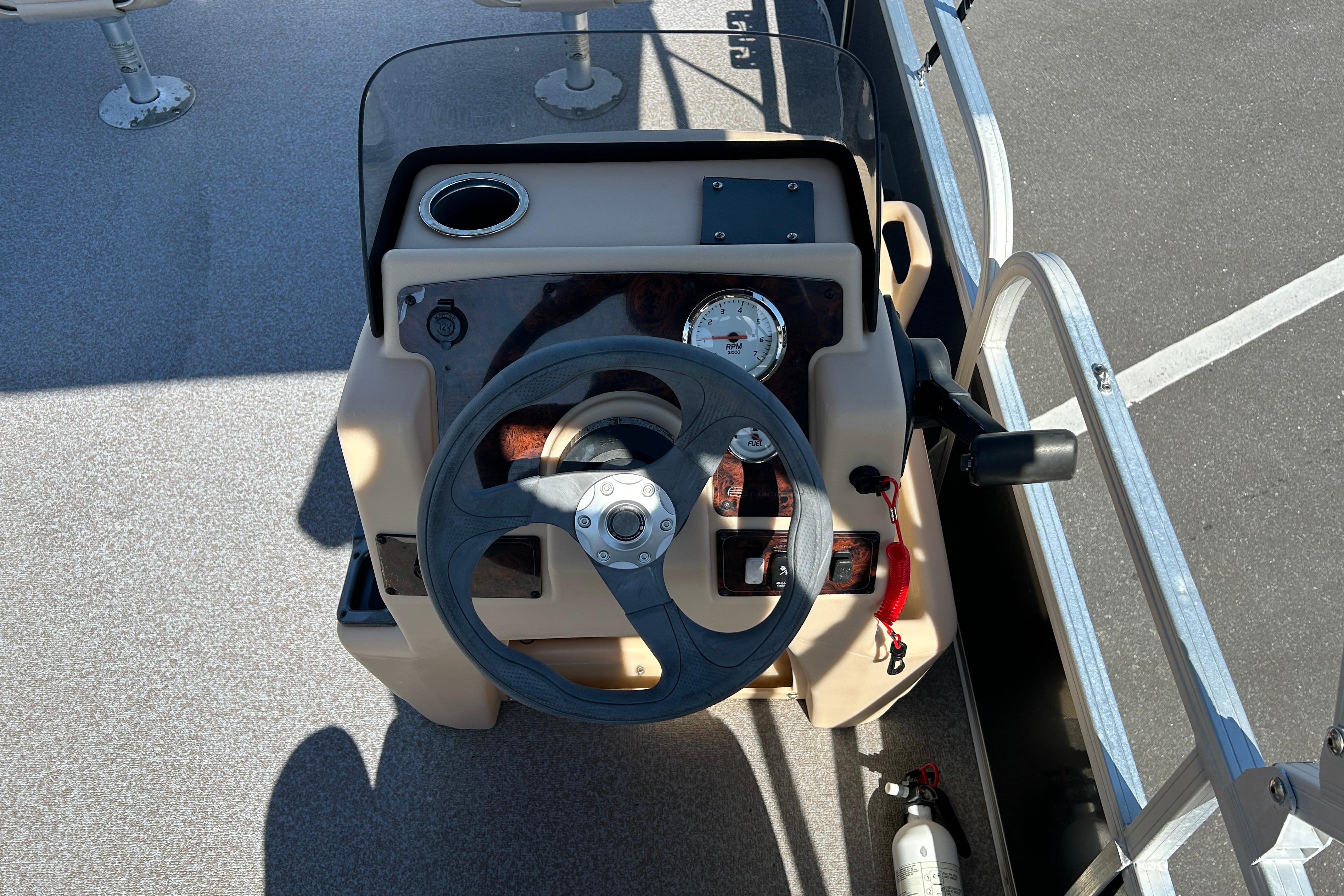 Steering console of a 2017 Sun Tracker Bass Buggy 18 DLX pontoon boat.