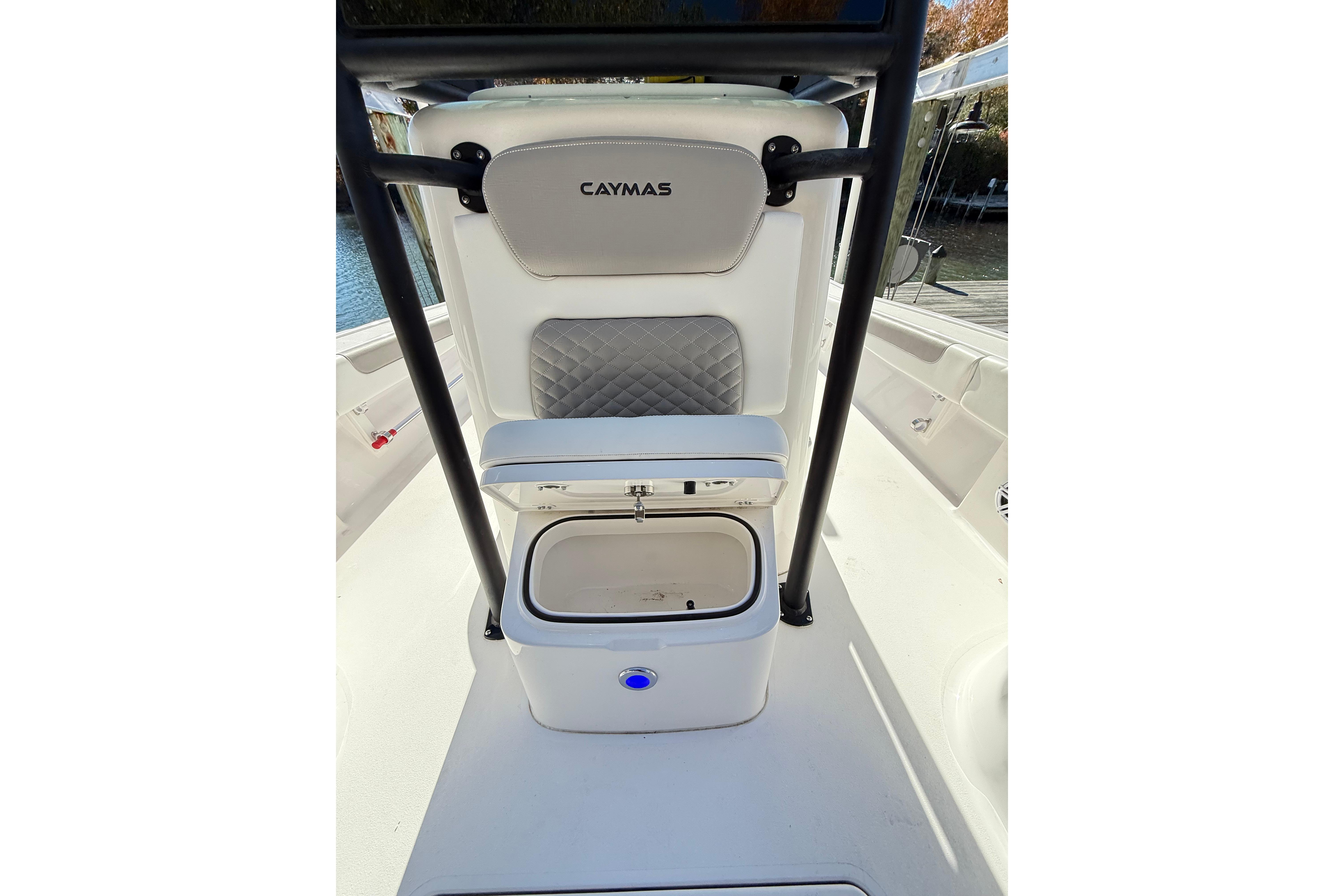 2023 Caymas 281 HB boat interior with seating and storage compartment.