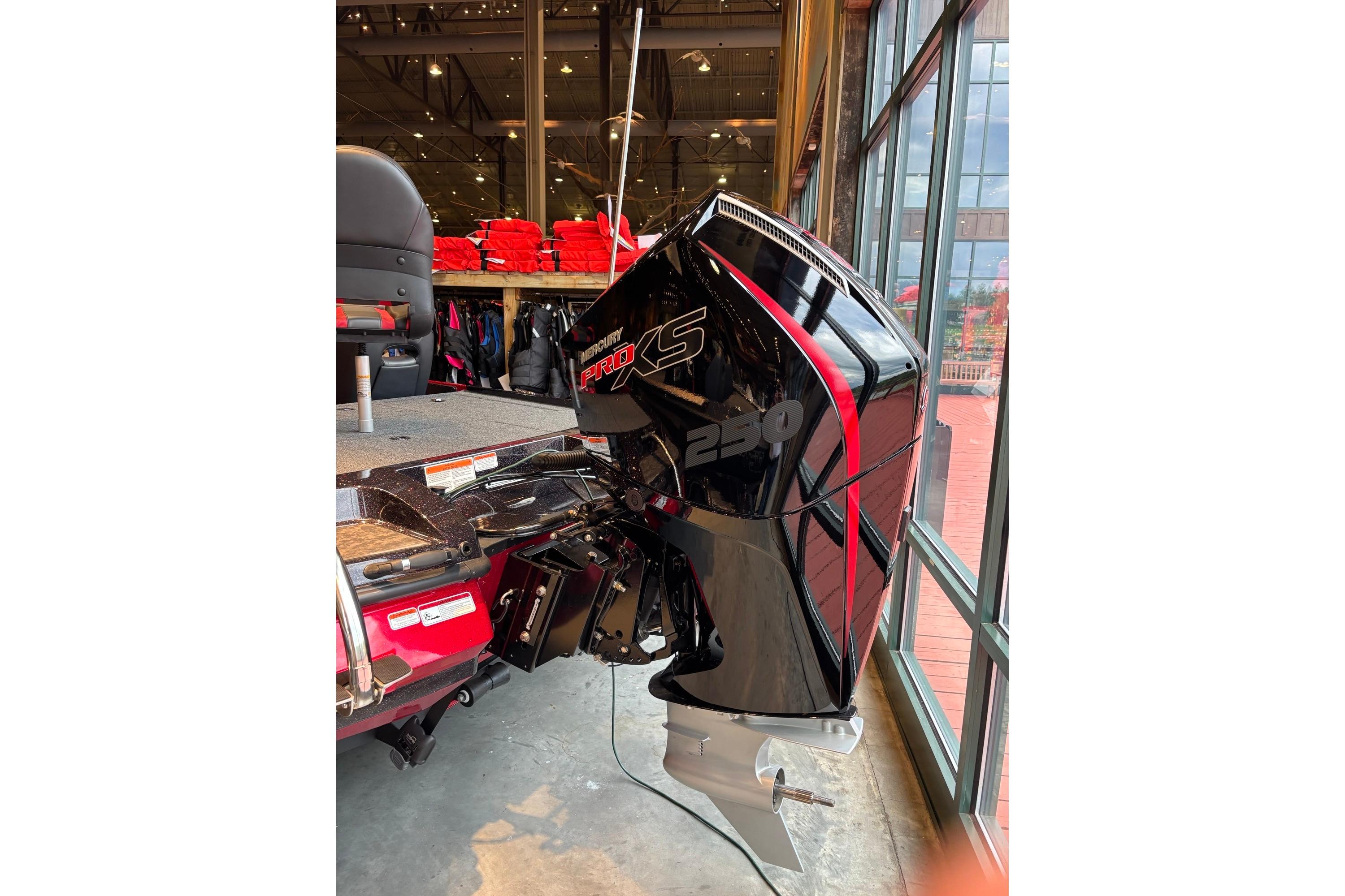 2026 Nitro Z20 XL Pro boat with Mercury Pro XS 250 engine displayed indoors.