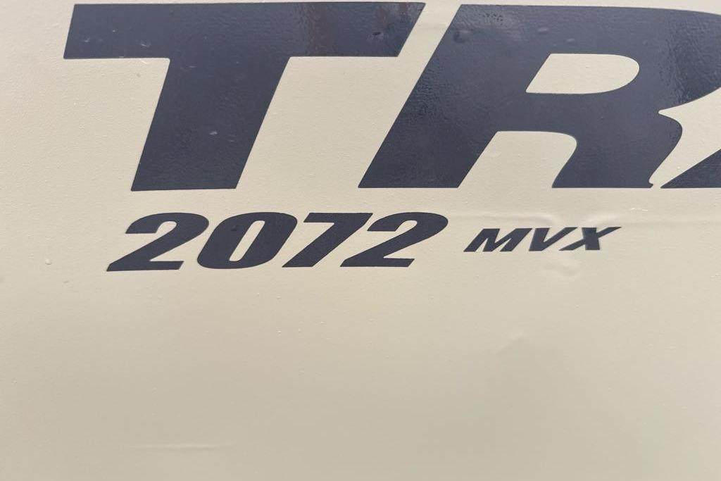 Close-up of Tracker Grizzly 2072 CC 2026 model logo on boat surface.