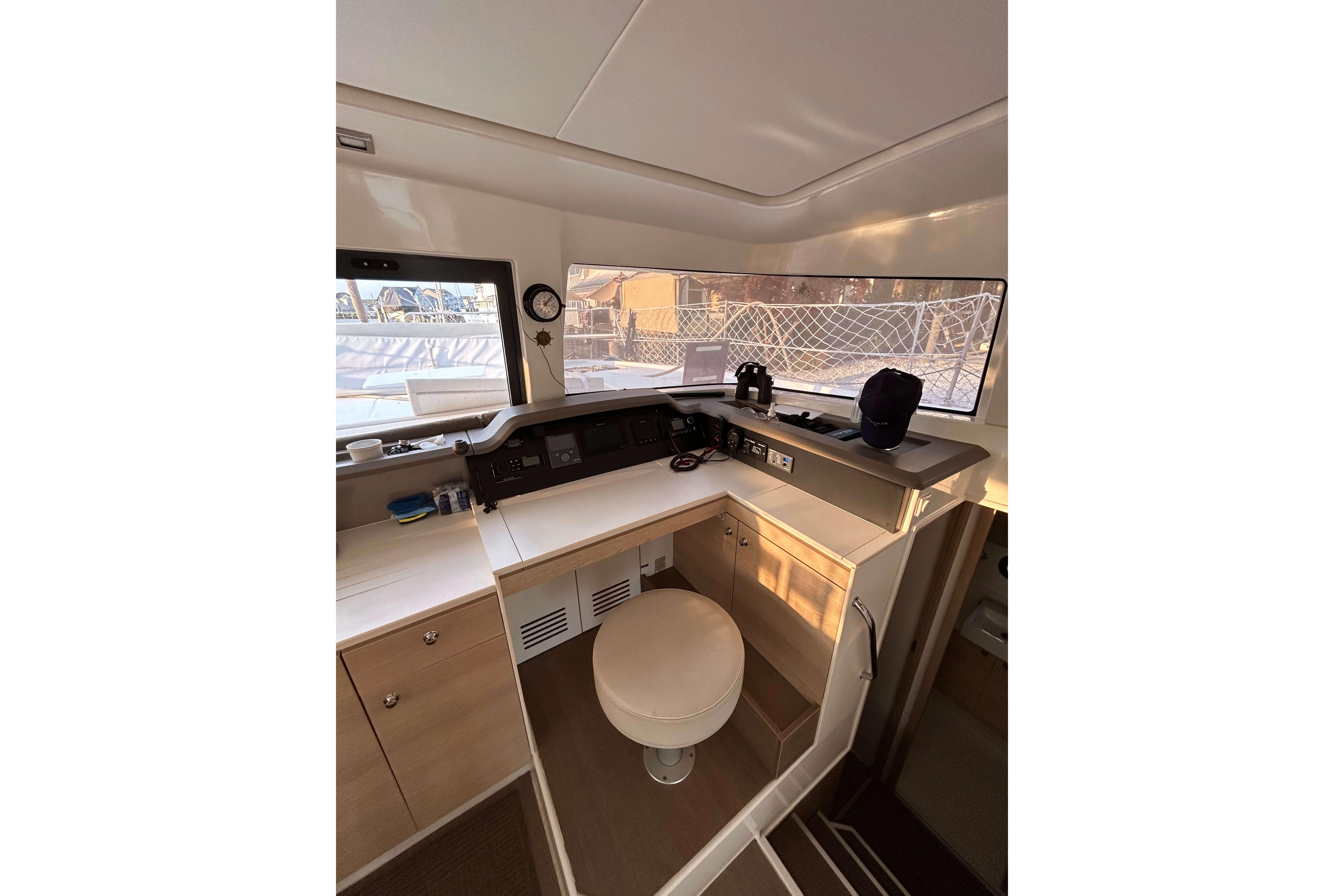 Interior of 2018 Bali 4.1 yacht cockpit with navigation equipment and seating.