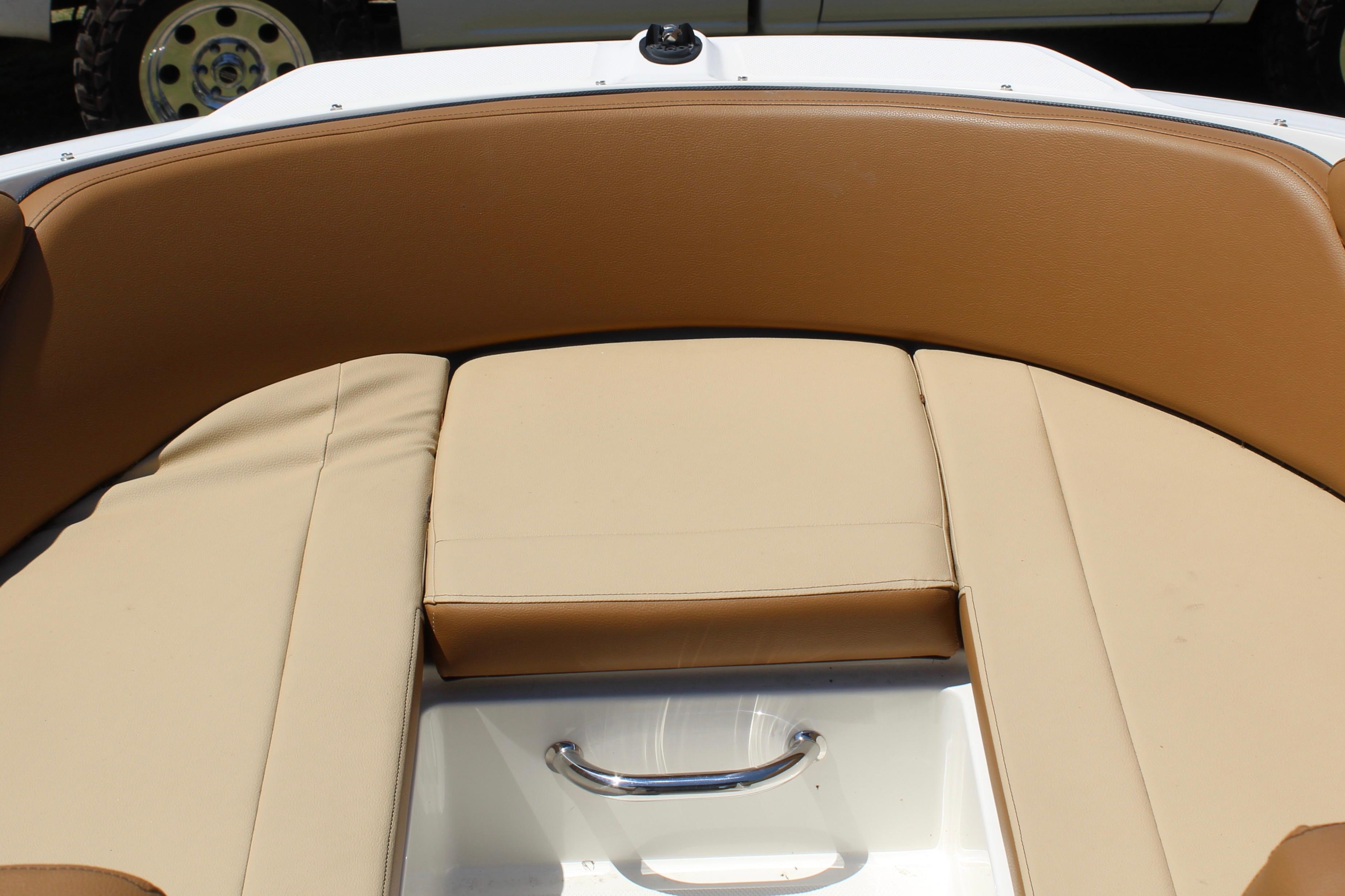 2018 Sea Ray SPX 190 Outboard boat interior with tan leather seating and storage handle.