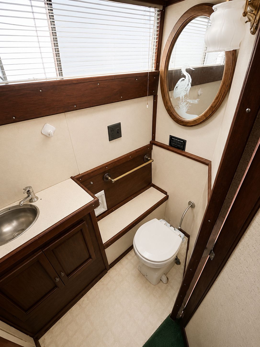 Interior view of the bathroom on a 1951 Chris-Craft 50 Catalina boat.