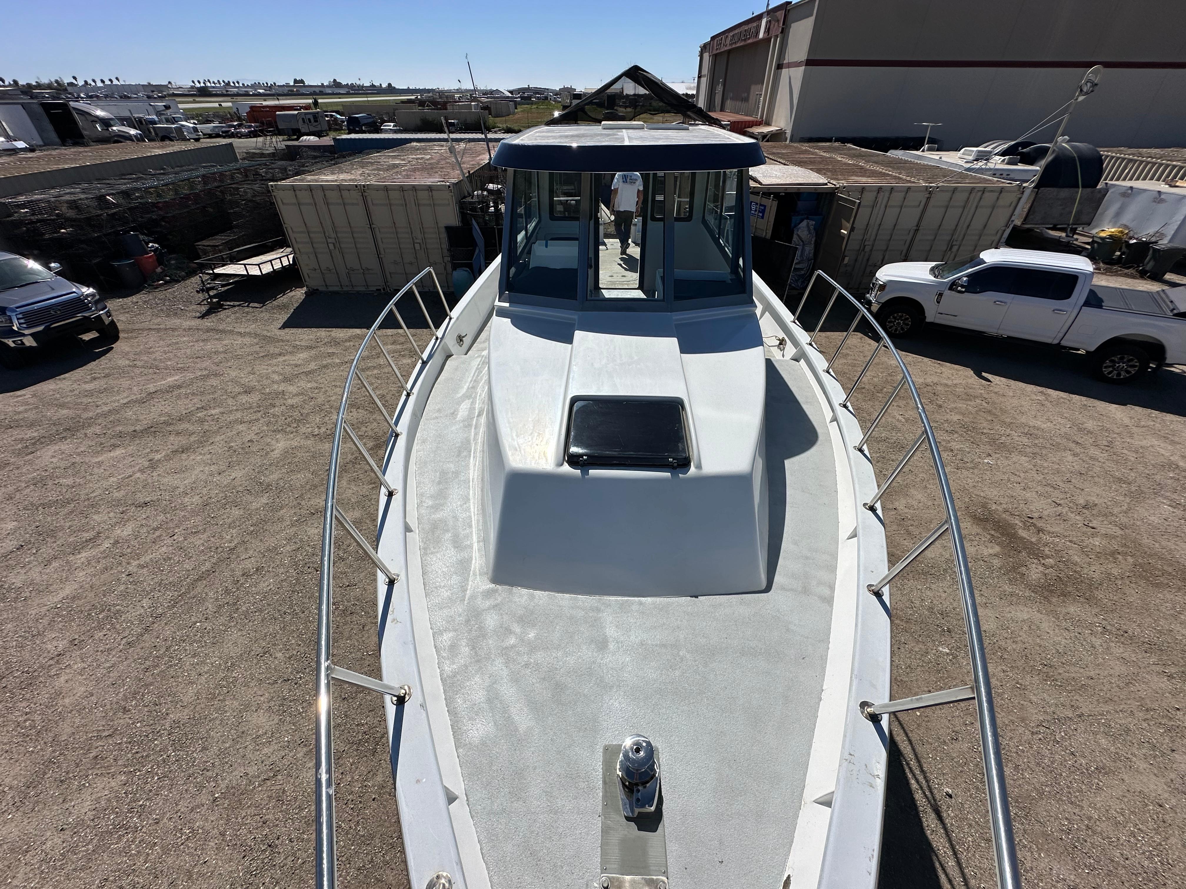 Custom 1992 Hueneme Boat Works vessel in a shipyard, top deck view.