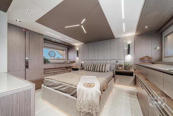 Luxurious bedroom interior of 2025 Sunseeker Manhattan 68 yacht, featuring modern design and elegant furnishings.