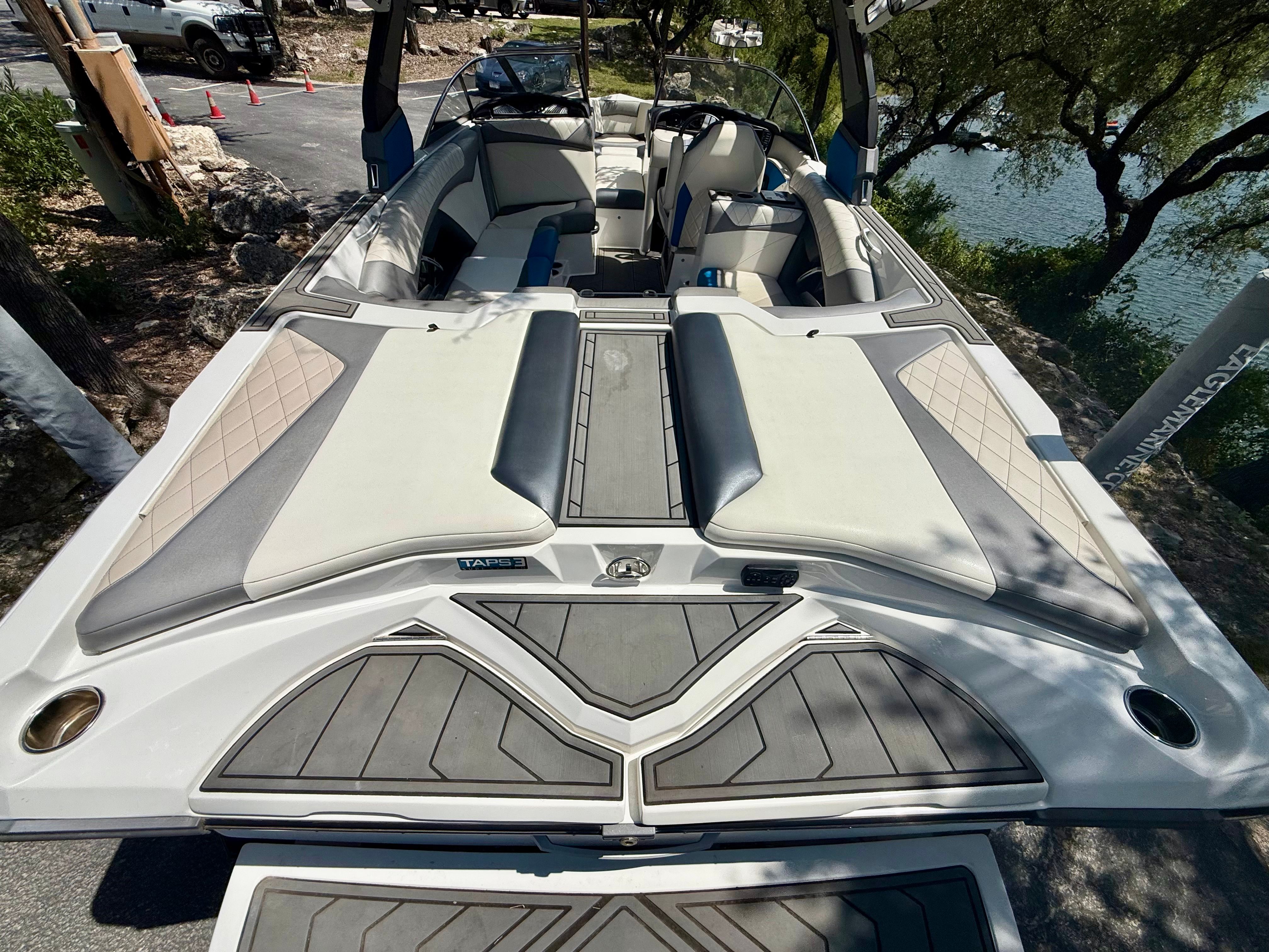 The image shows a 2017 Tigé Z3 boat with stylish seating and a modern design.
