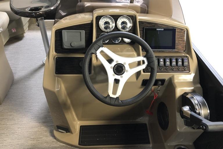 Steering console of 2027 Sylvan Mirage 820 CLZ DH pontoon boat, featuring modern controls and gauges.