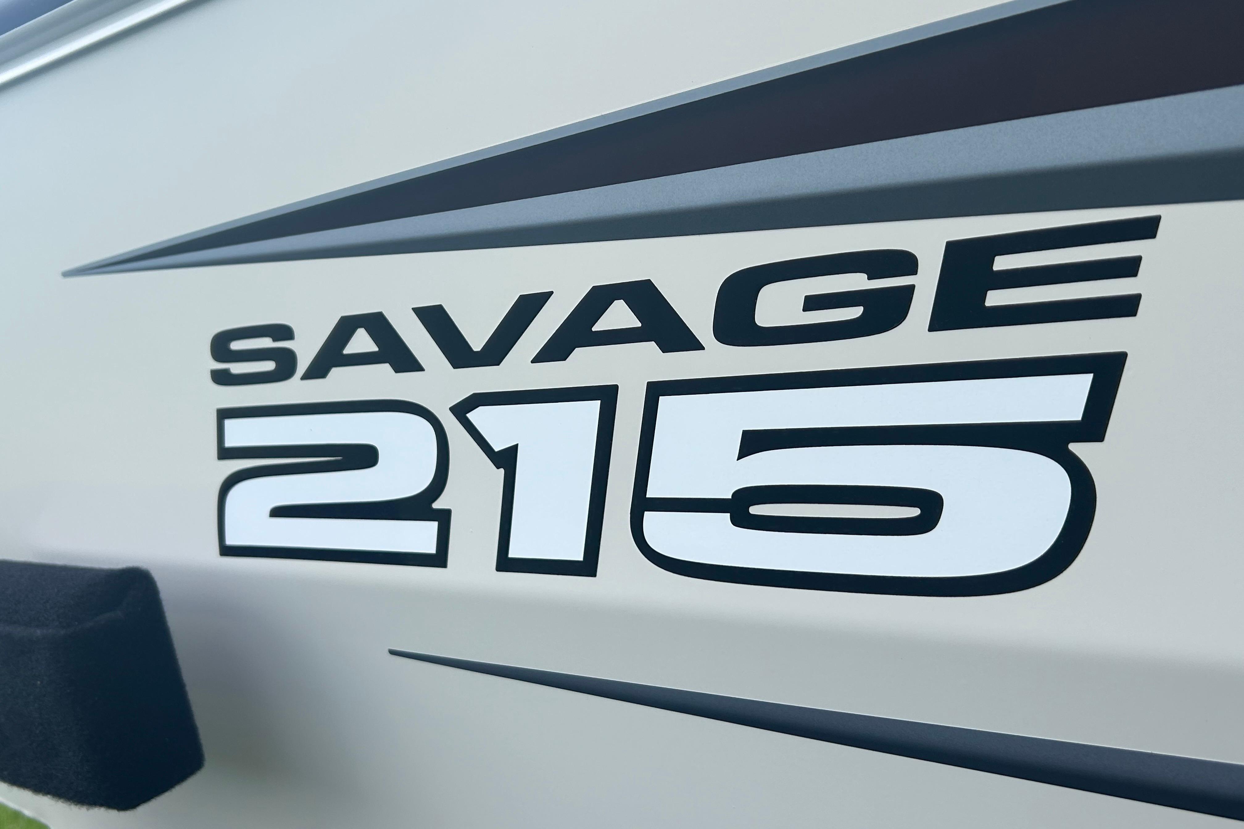 2025 Tracker Savage 215 boat logo with bold lettering on the side.