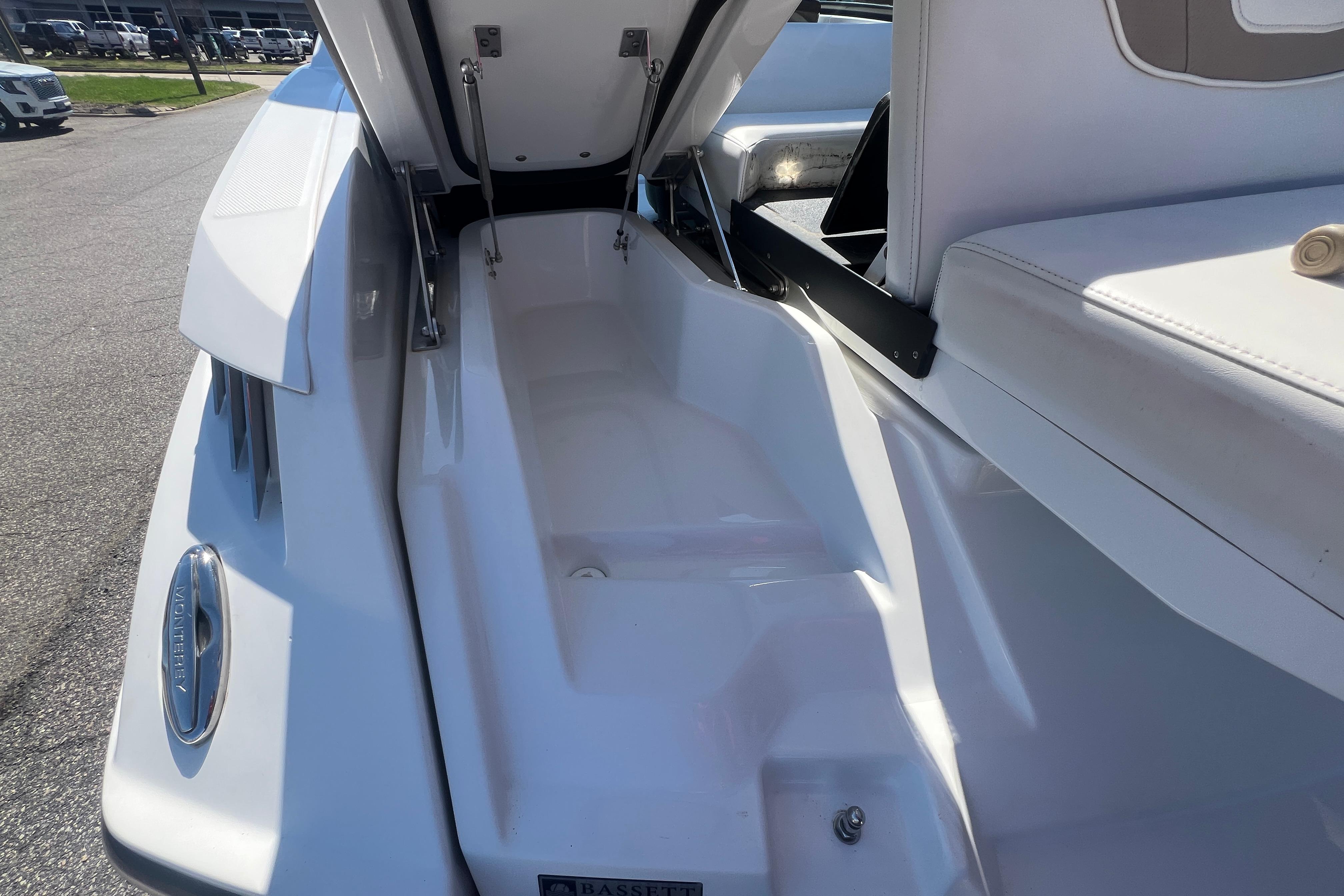2017 Monterey 298SS Super Sport boat interior with open storage compartment.