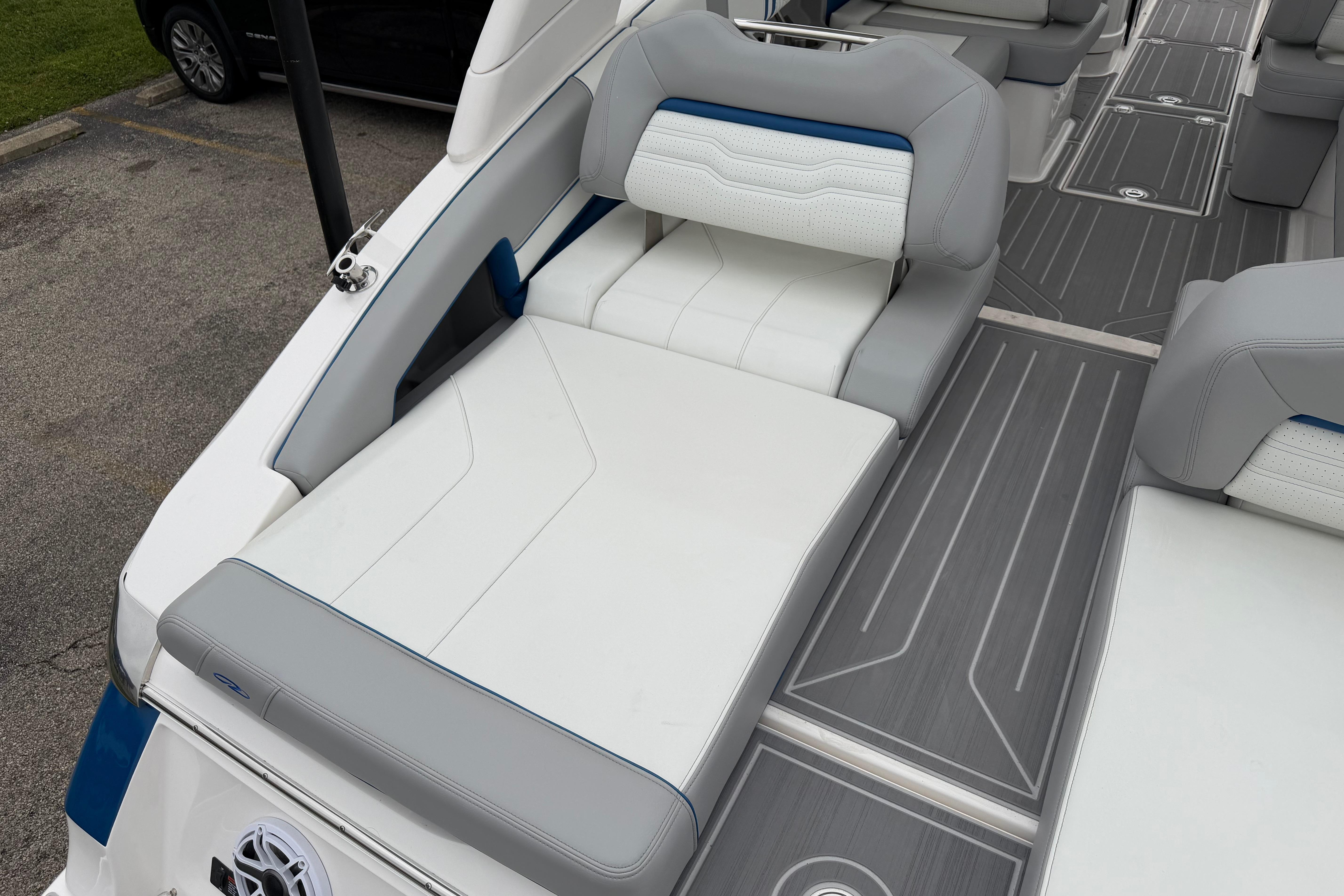 2026 Regal LS9 Surf boat interior with gray and white seating and sleek flooring.