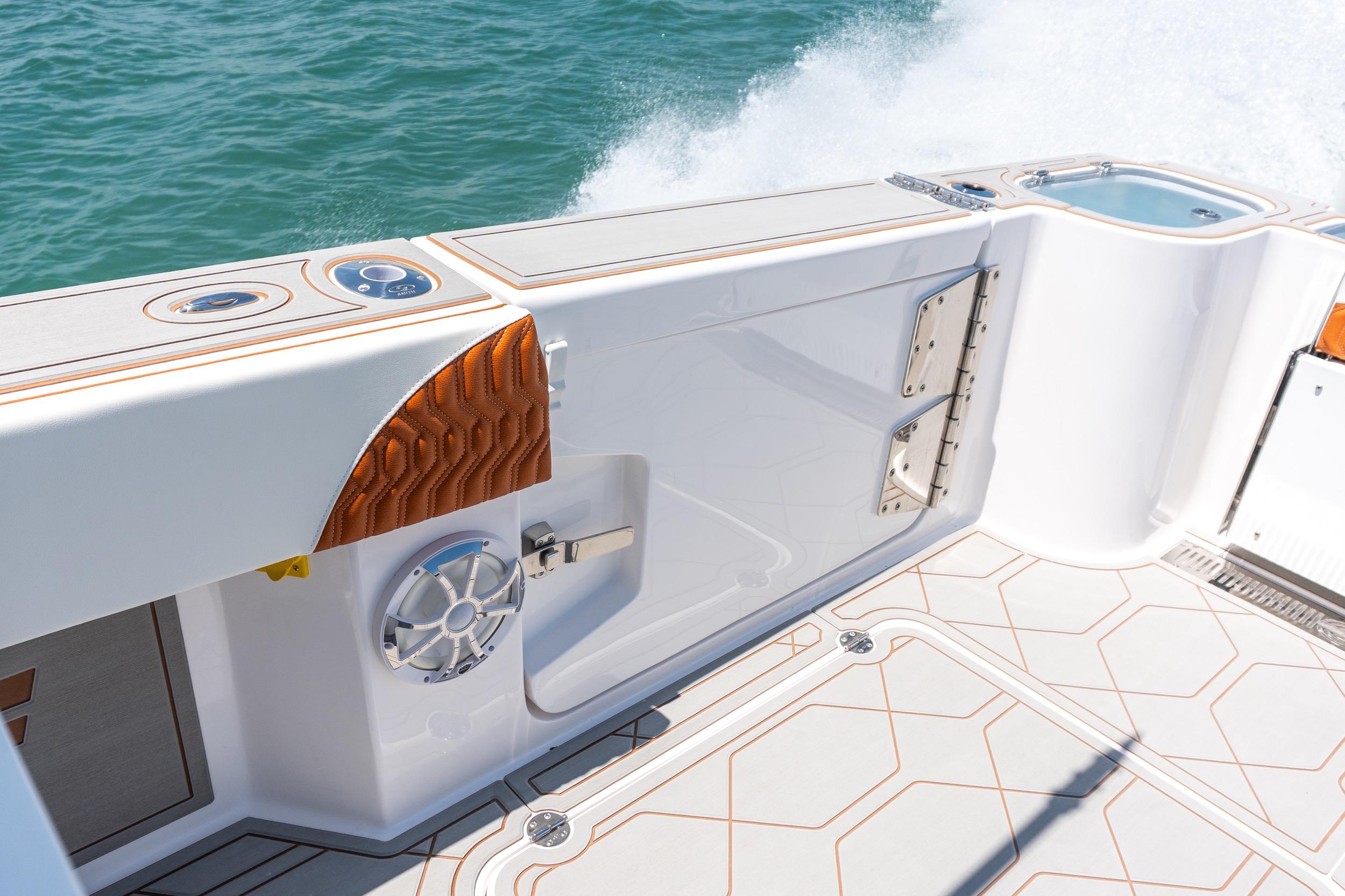 2026 Twin Vee 400 GFX2 CC boat interior with sleek design and ocean backdrop.