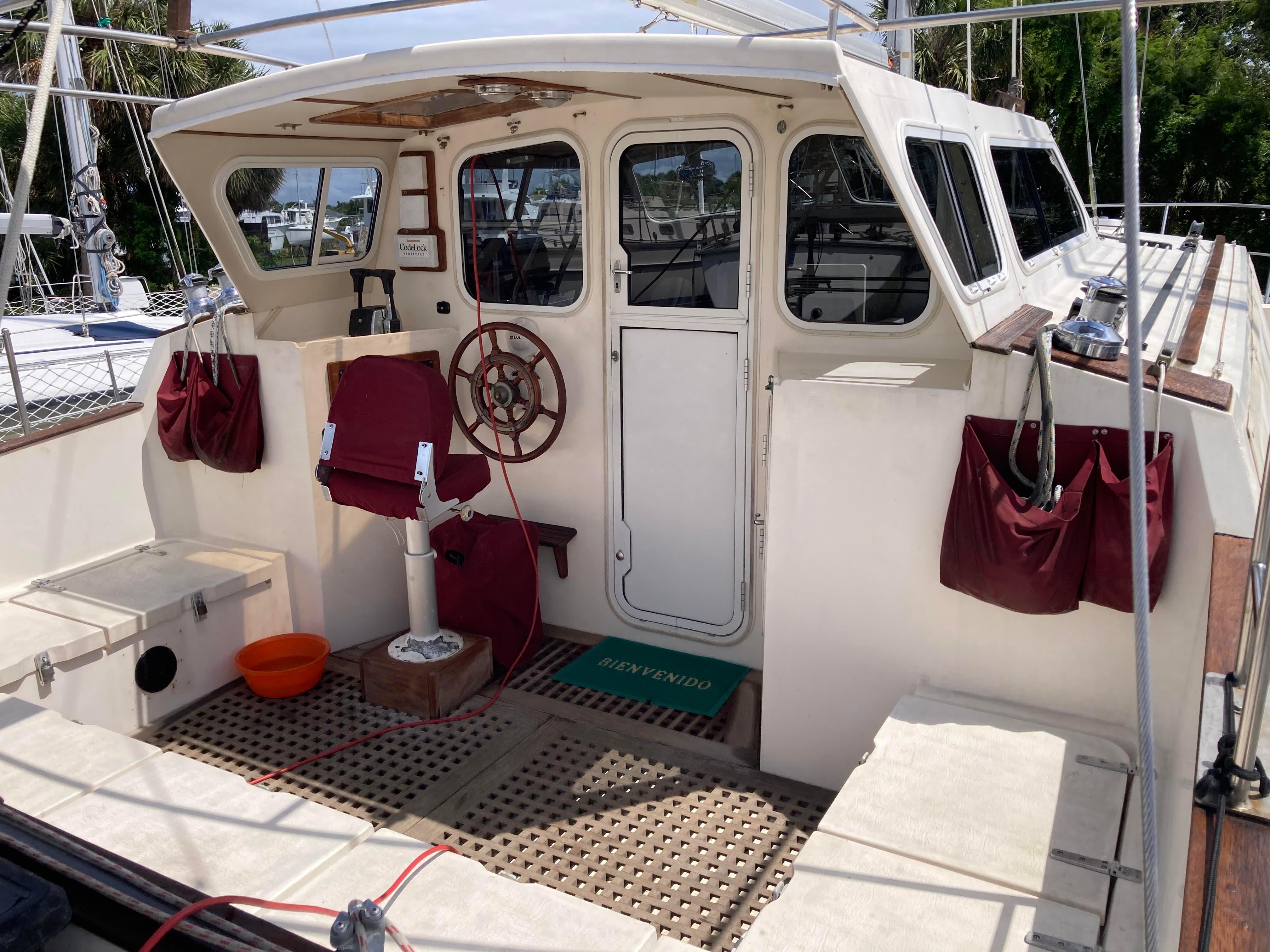 1994 Catalac 11 Meter sailboat cockpit with steering wheel and seating.