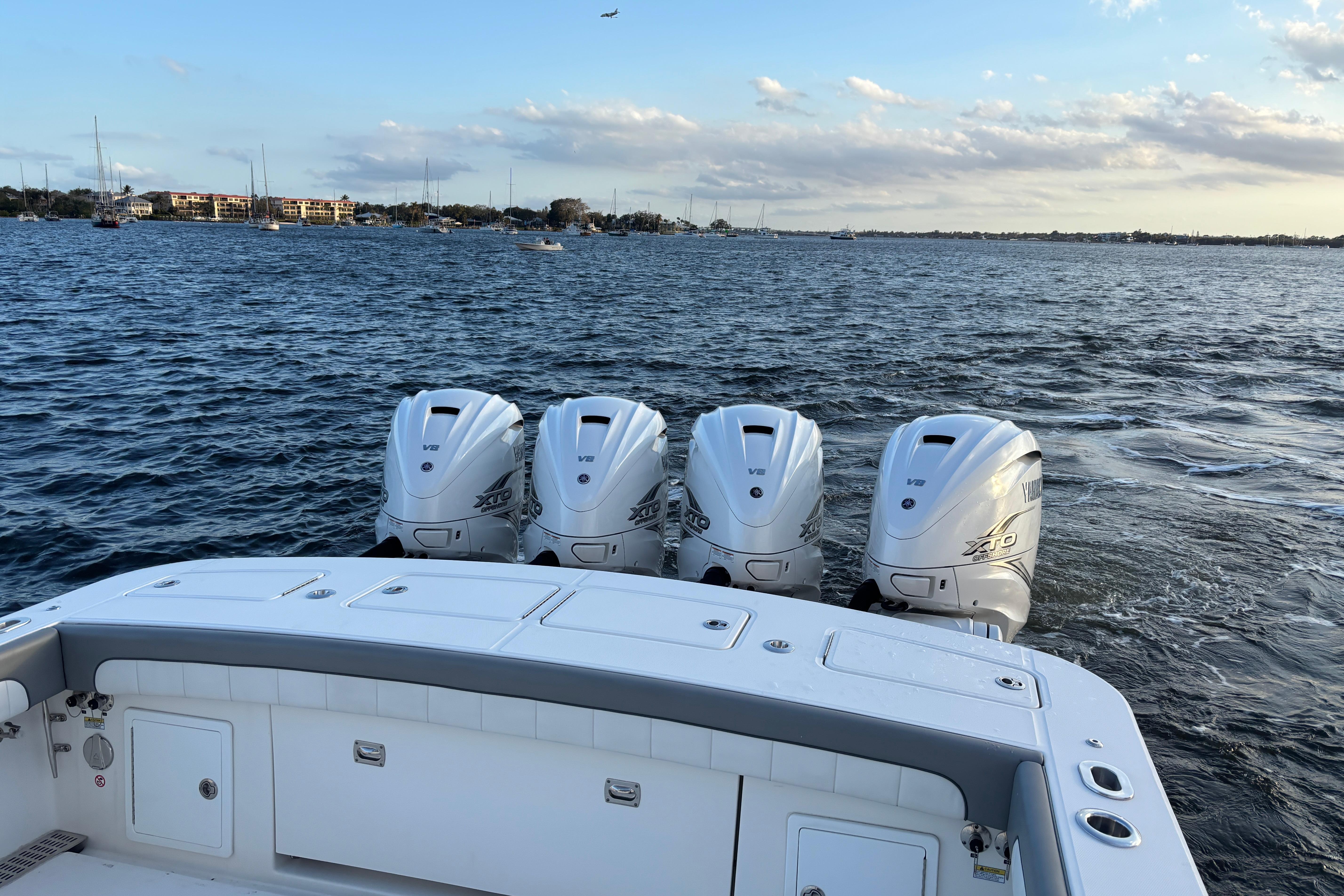 2023 Regulator 41 boat with four Yamaha V8 engines on open water.