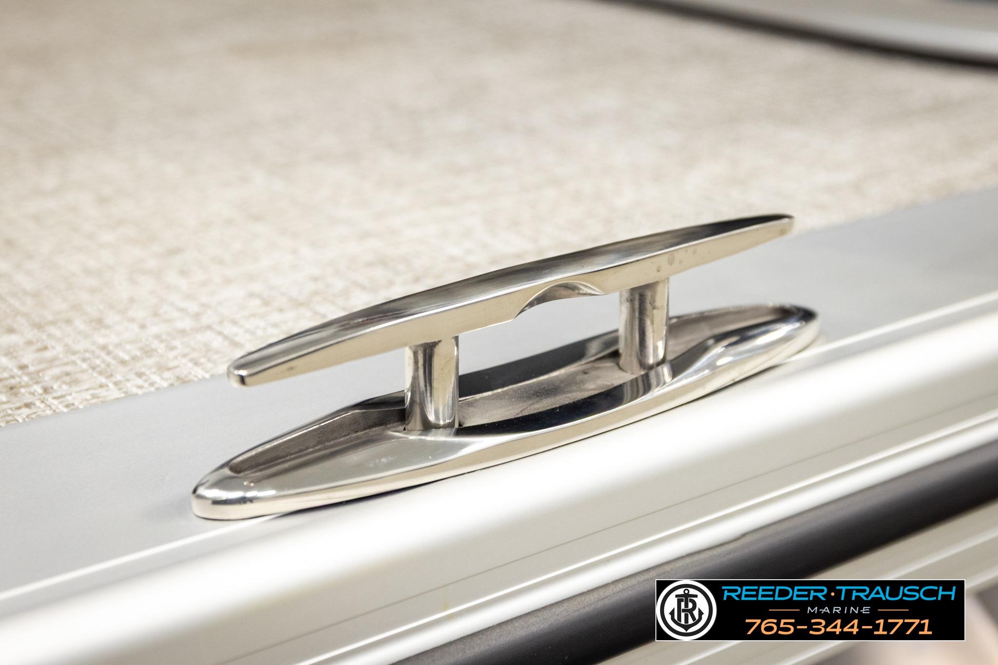 Chrome cleat on 2026 Avalon LSZ QL boat deck, Reeder-Trausch Marine branding.