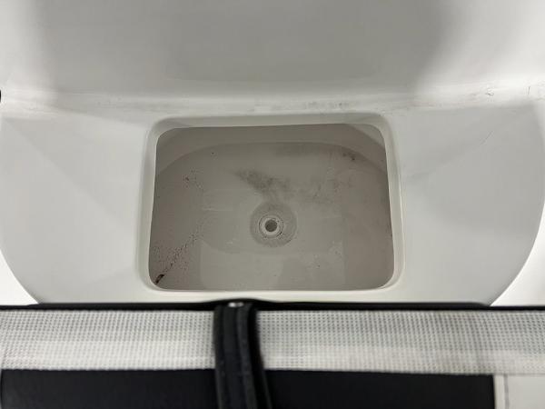 Interior view of a 2023 Tidewater 232 CC Adventure boat.