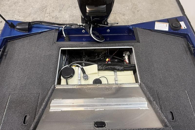 2026 Lowe Stinger 175C boat interior showing engine compartment and wiring.