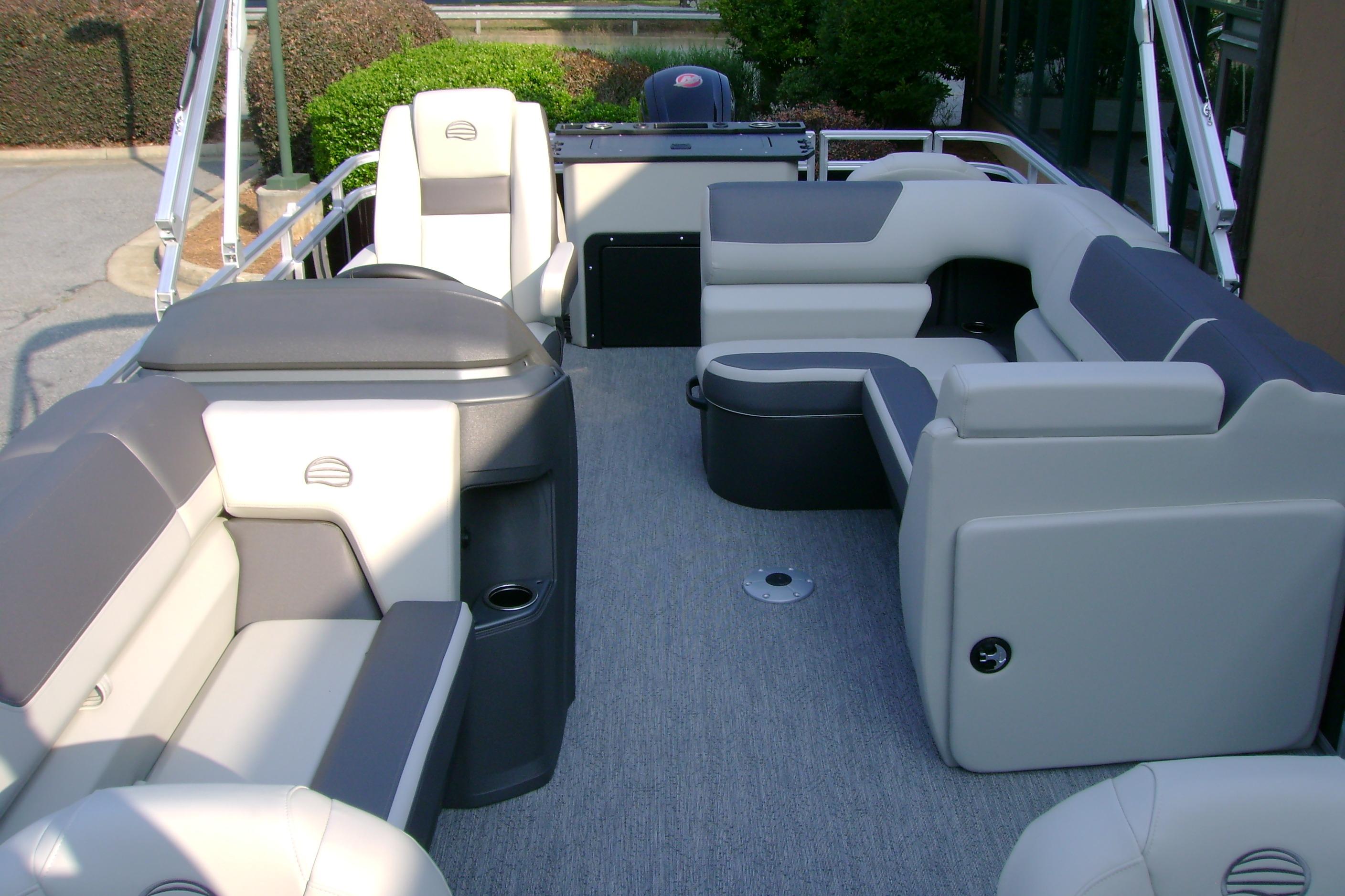 2026 Sun Tracker Fishin' Barge 20 DLX interior with spacious seating and modern design.