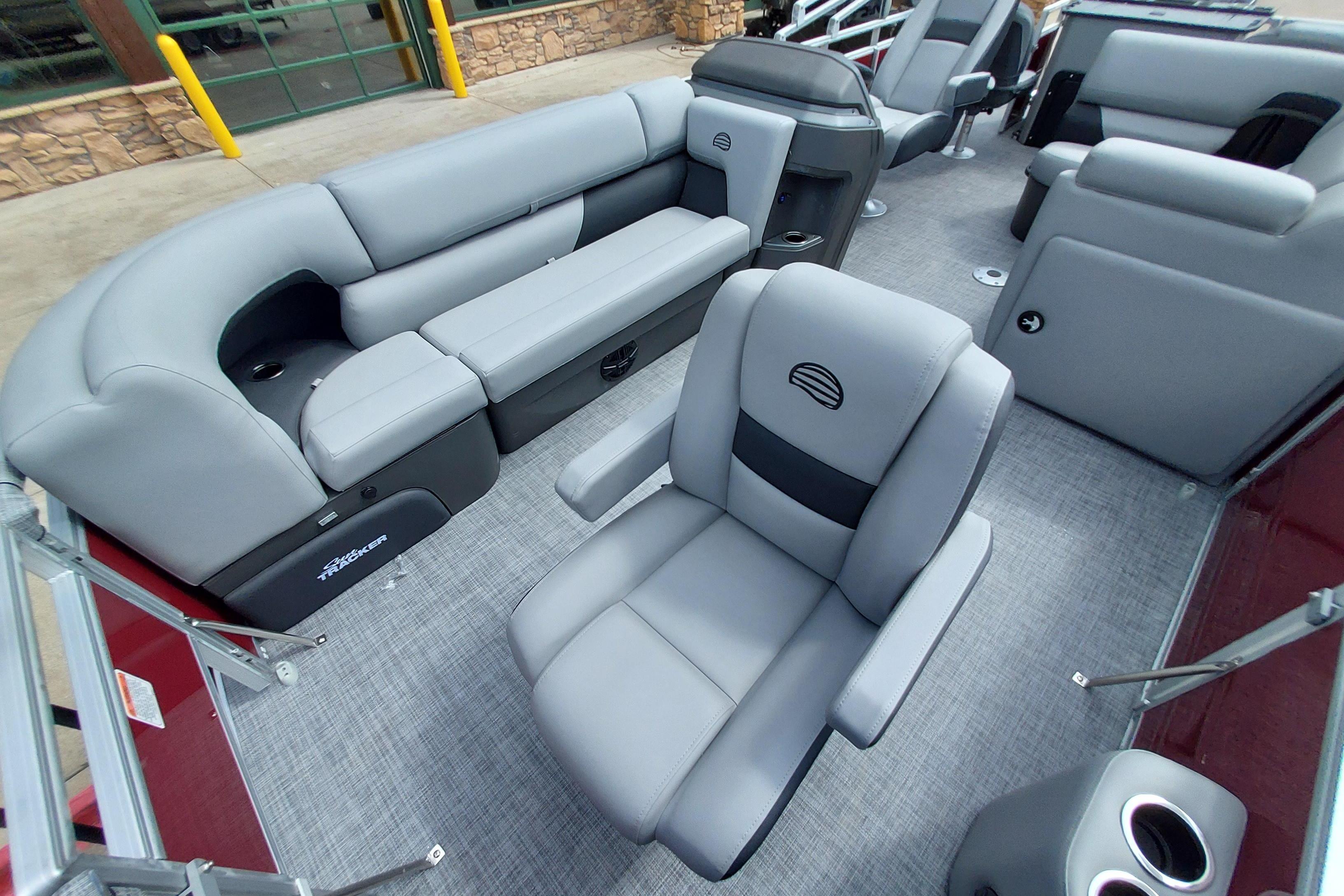 2026 Sun Tracker SportFish 20 DLX pontoon boat interior with gray seating and modern design.