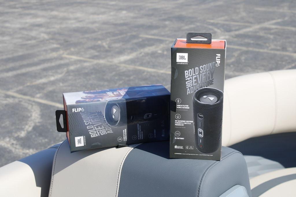 JBL Flip 6 speakers on Avalon AURA QUAD LOUNGER 2026 boat seat.