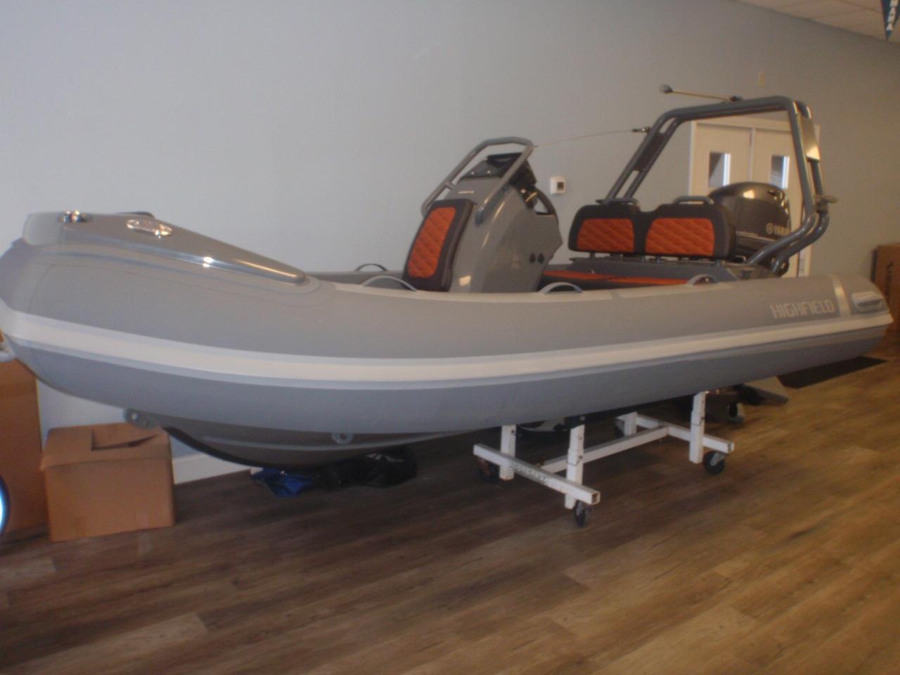 2025 Highfield Sport 390 inflatable boat displayed indoors on a stand.
