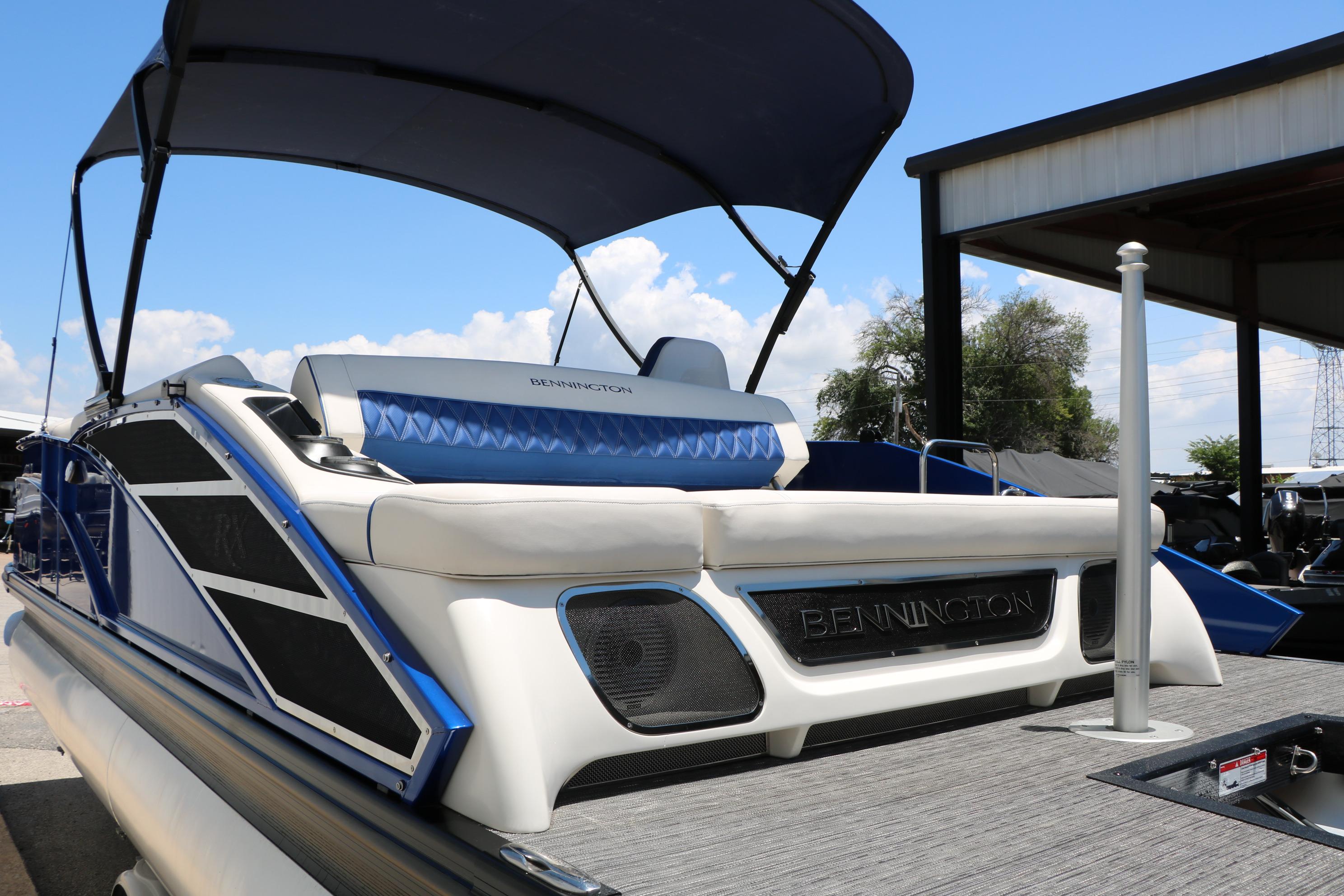 2024 Bennington 23 RX Swingback pontoon boat with sleek design and comfortable seating.